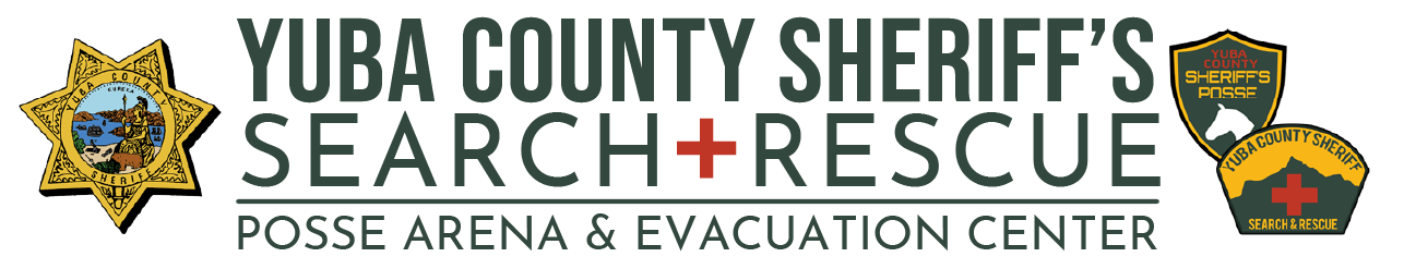 Logo of Yuba County Sheriff's Search & Rescue, featuring badges with mountain and water scene, and text indicating Posse Arena & Evacuation Center.