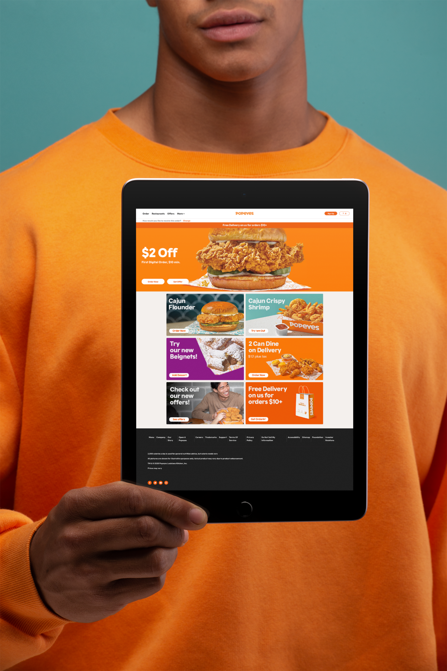 mockup-of-an-ipad-being-held-against-a-man-s-chest-22637.png
