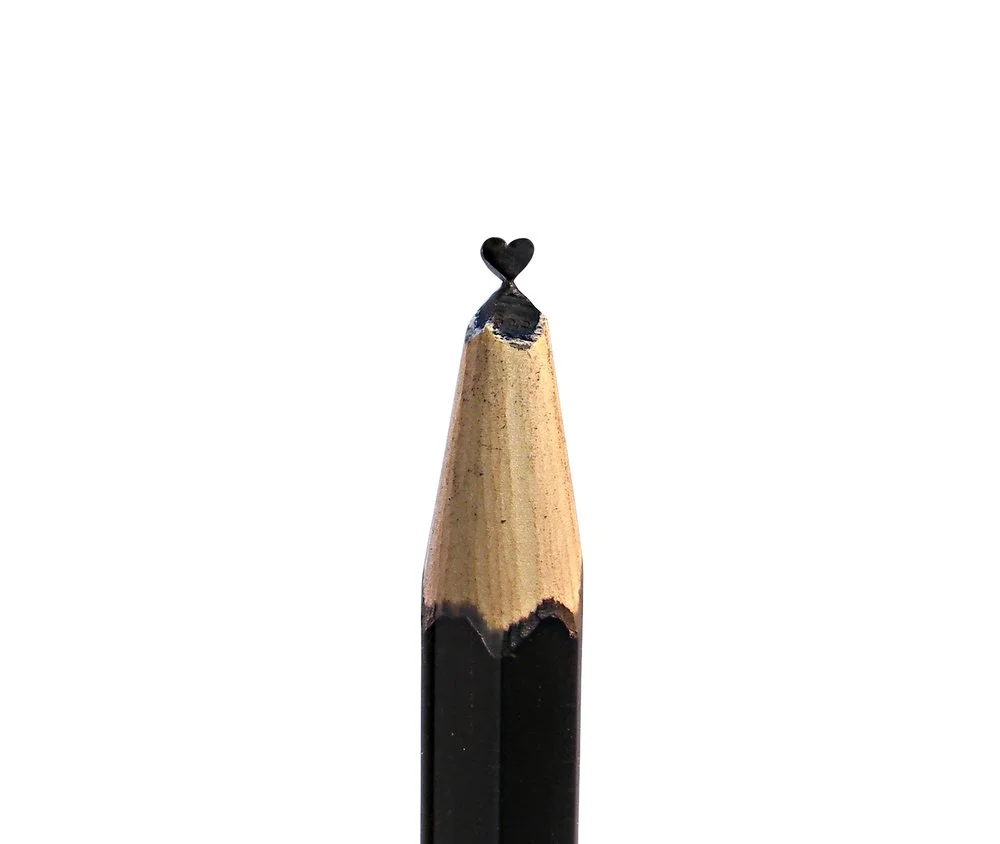 Black heart pencil carving