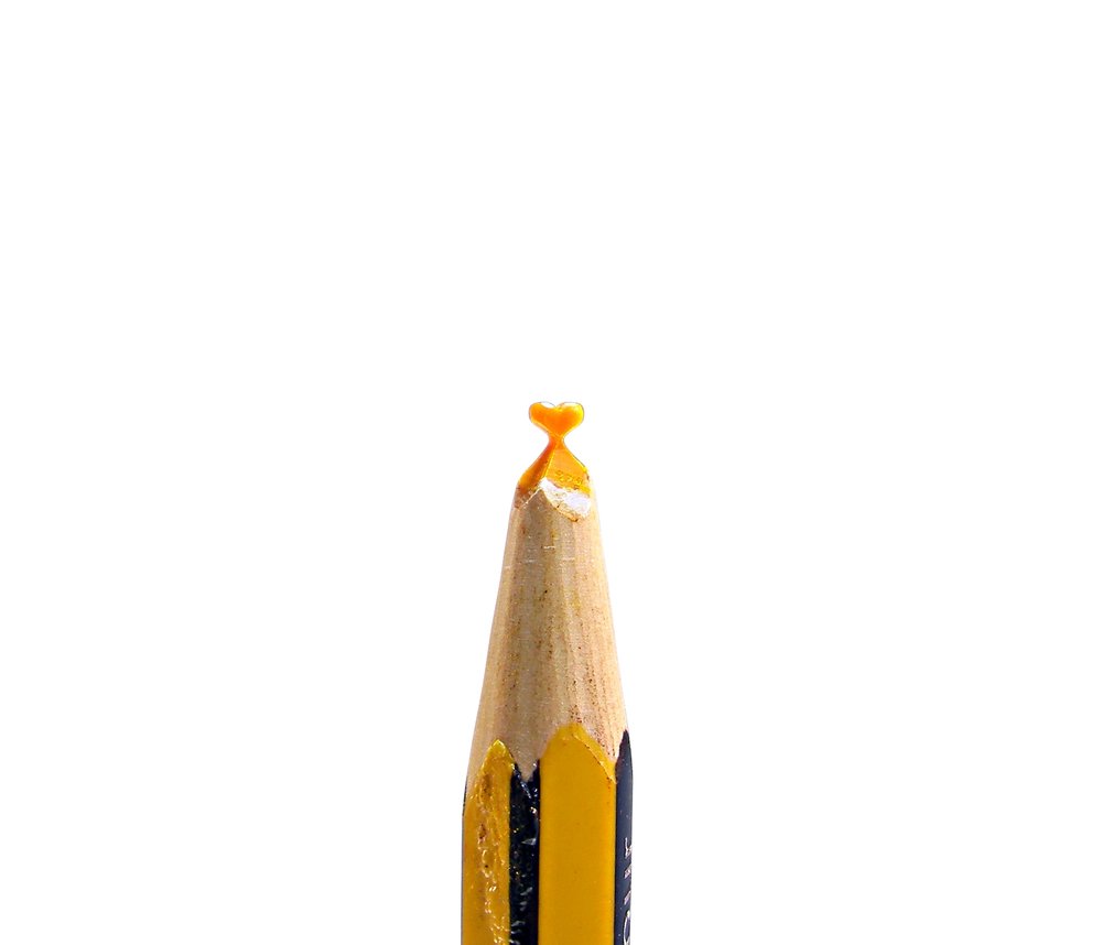 Golden Ochre heart pencil carving