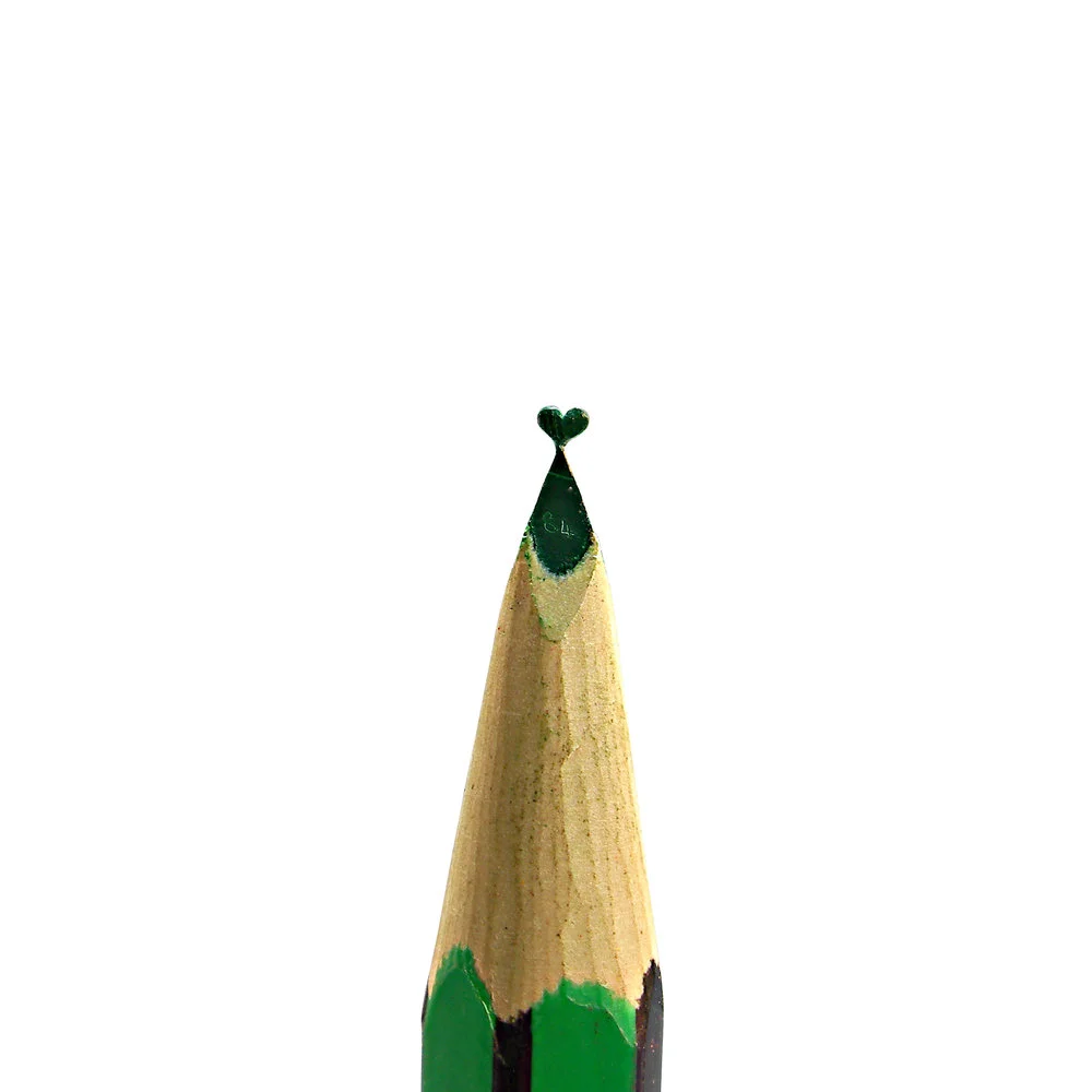 Green heart pencil carving