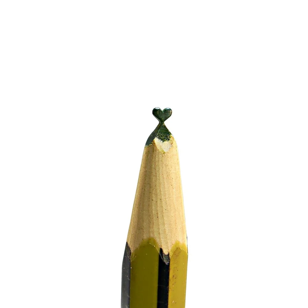 Olive green heart pencil carving