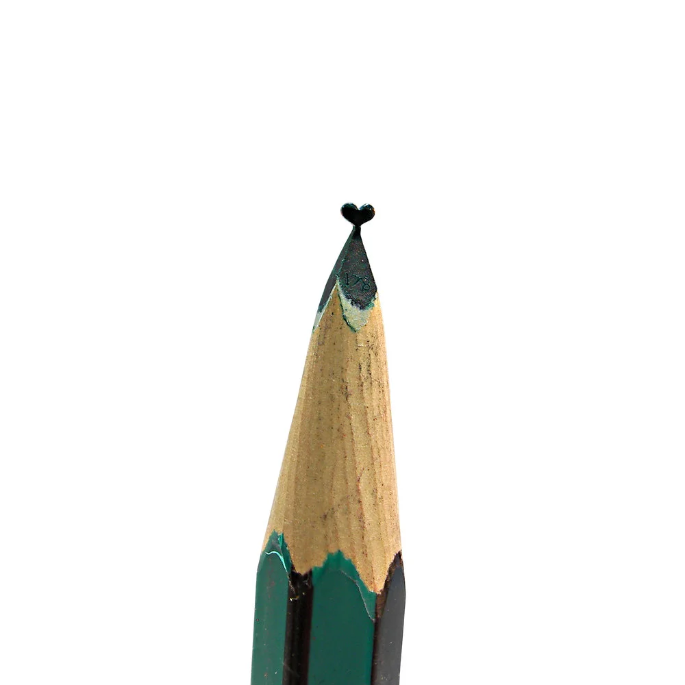 Turquoise heart pencil carving