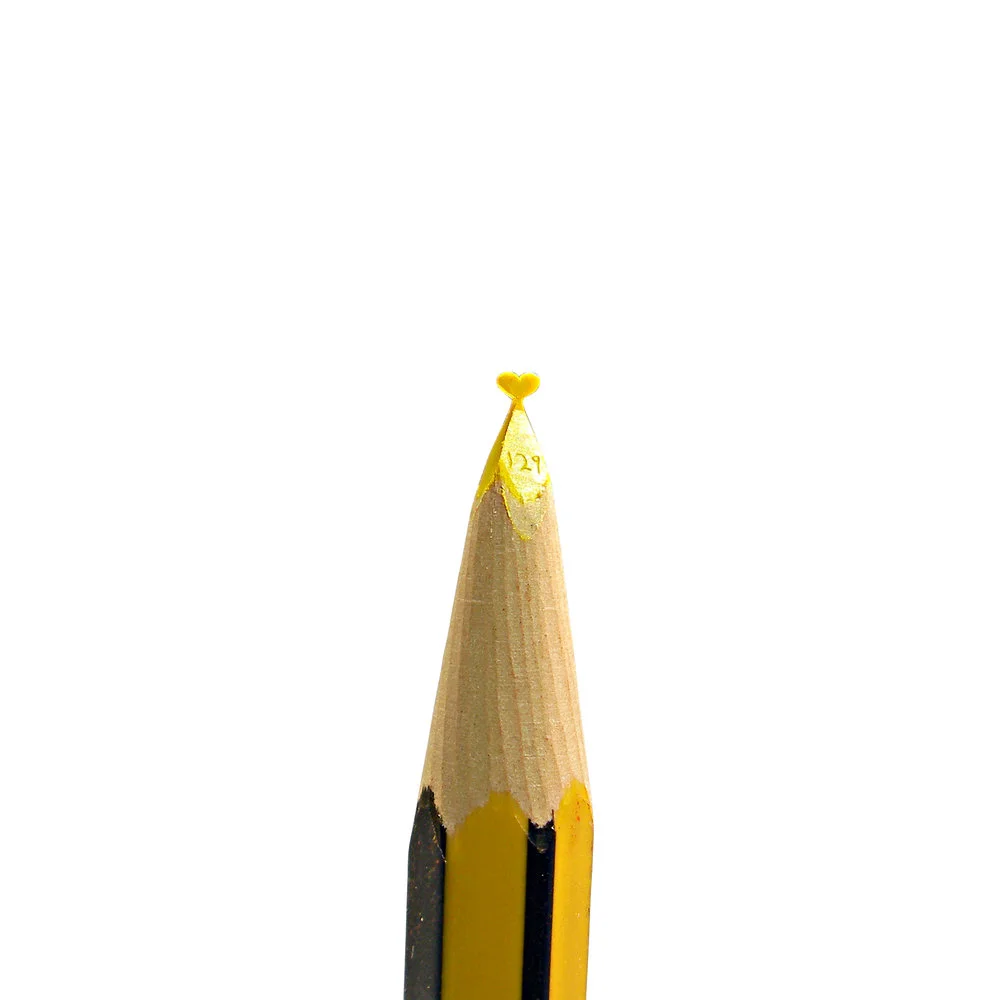 Yellow heart pencil carving