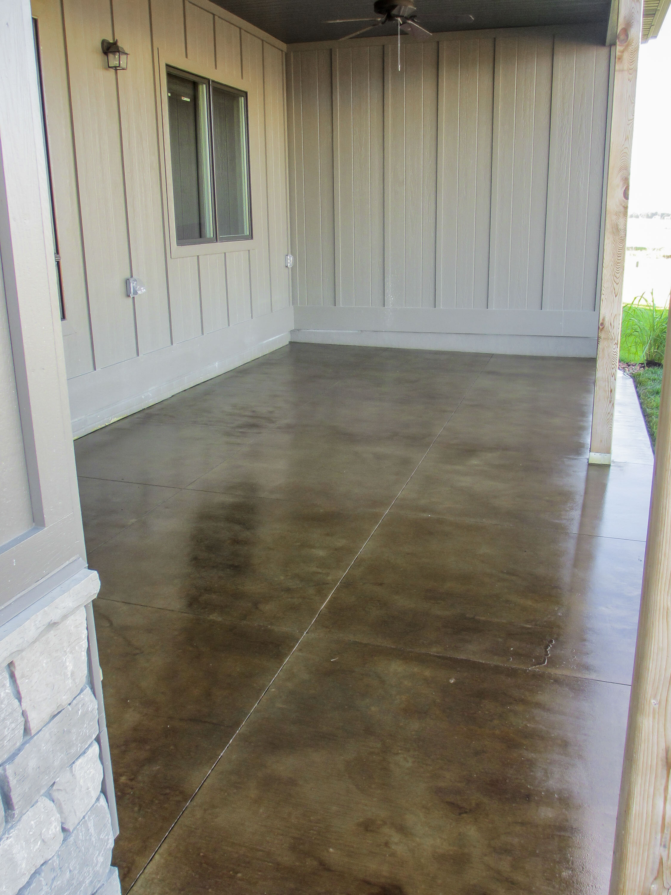 nathan raisch - Finished Concrete- Outside Stain Henna_Stone_Clad_Residential_Patio.jpg
