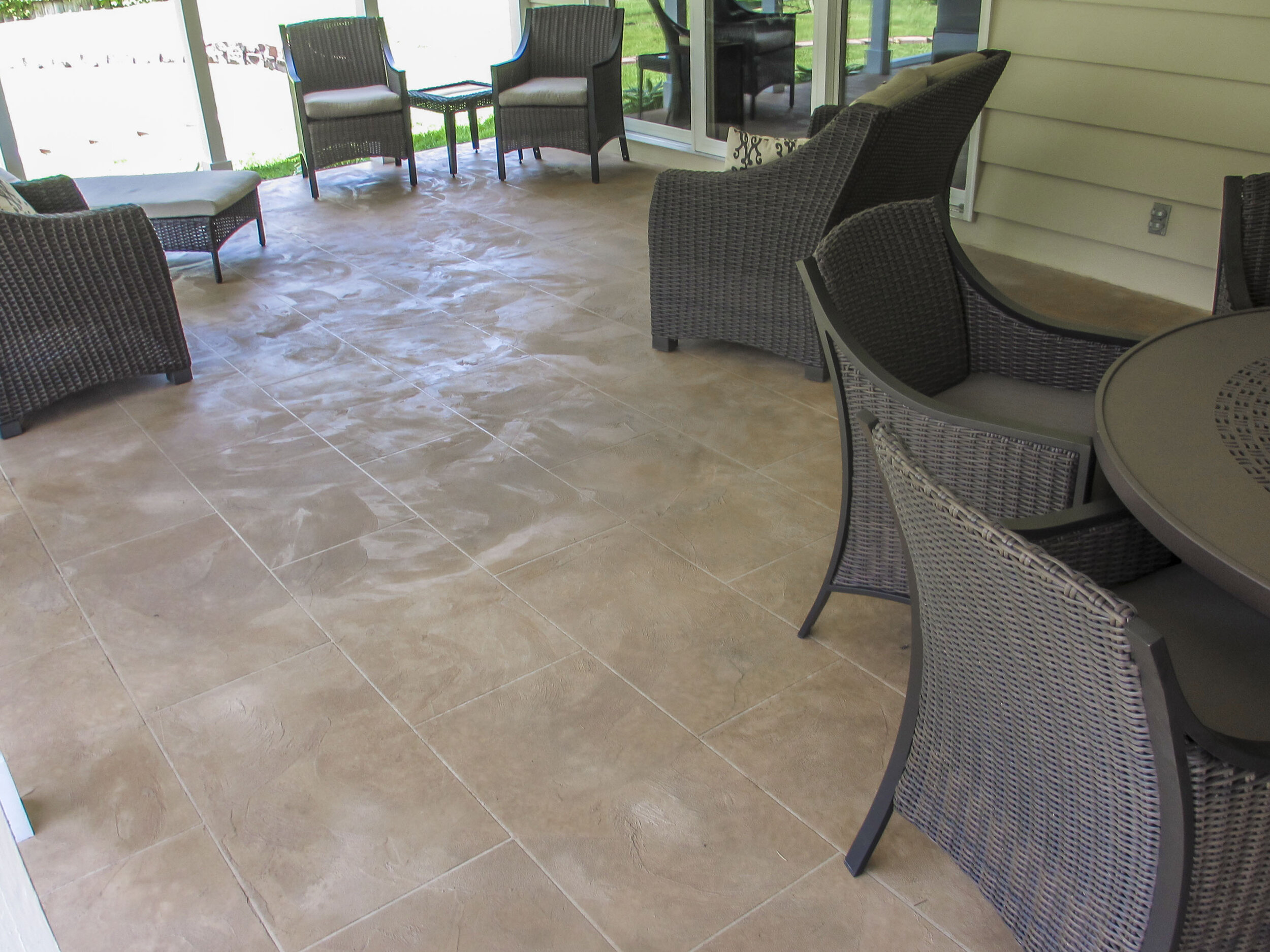 nathan raisch - Finished Concrete- Outside After_Stone_Clad_Residential_Patio.jpg