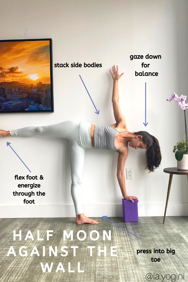 How a Wall Can Help You Practice Revolved Half Moon Pose
