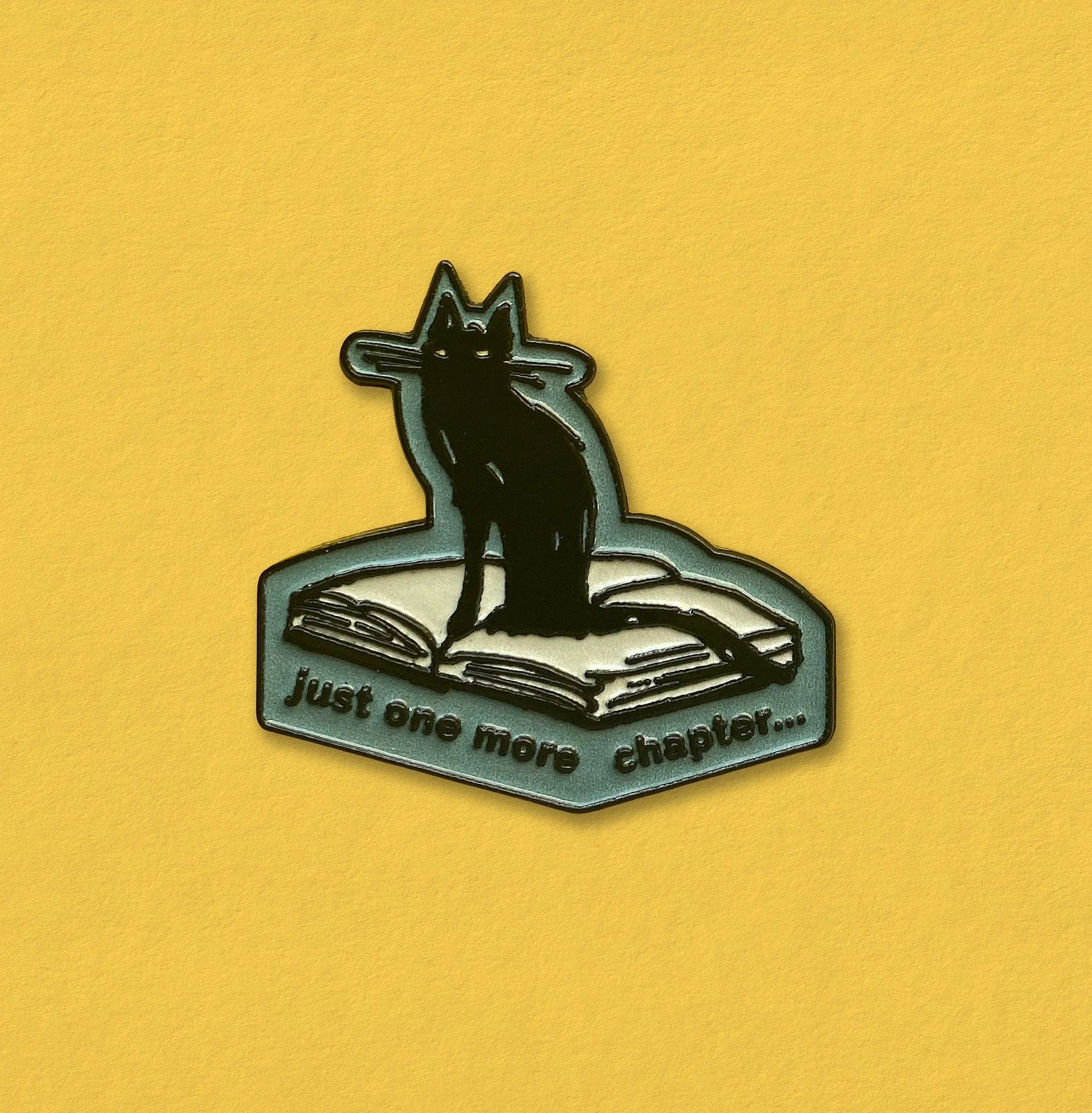 'One more chapter' enamel pin