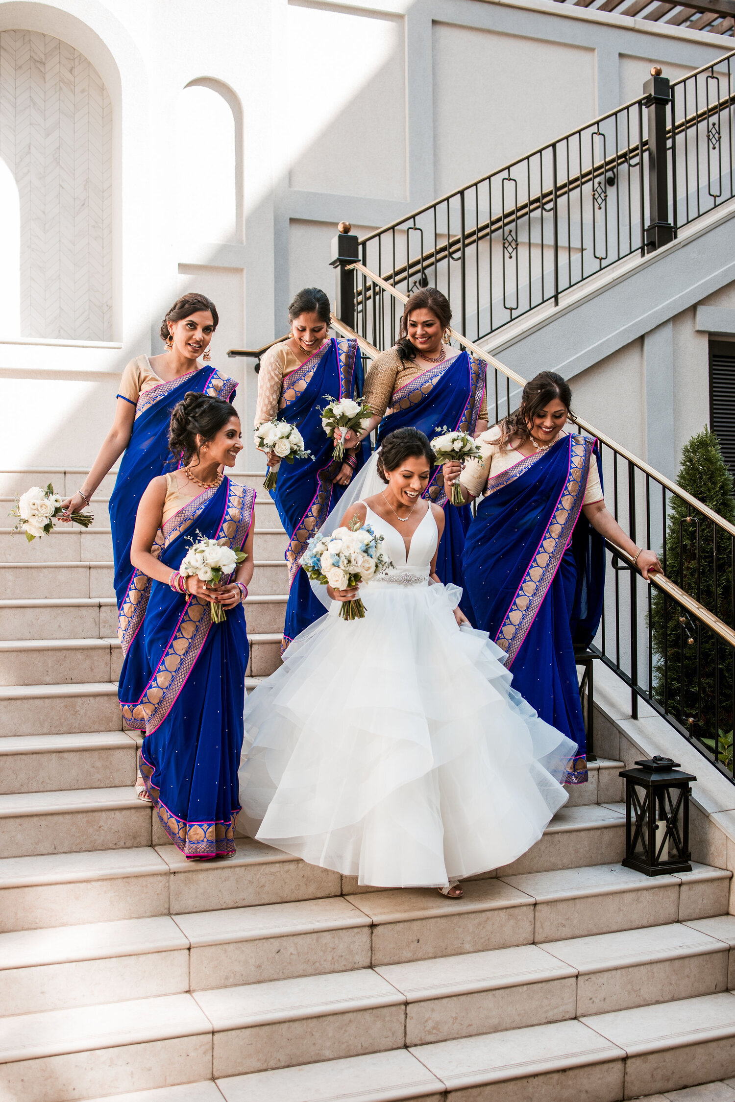  Bridesmaids wore traditional Indian saris in blue, pink and gold. | Harpeth Hotel 