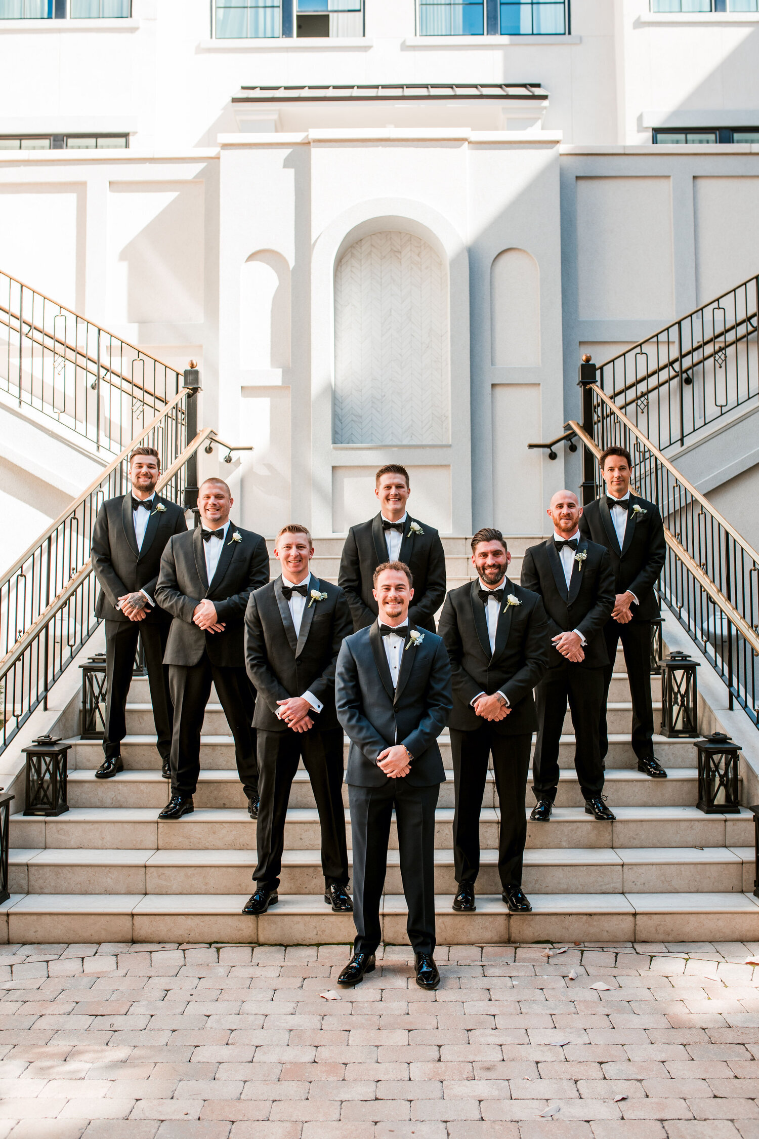  The groomsmen wore black suit's. James’ stands out with “midnight” and black accents. | Harpeth Hotel. 