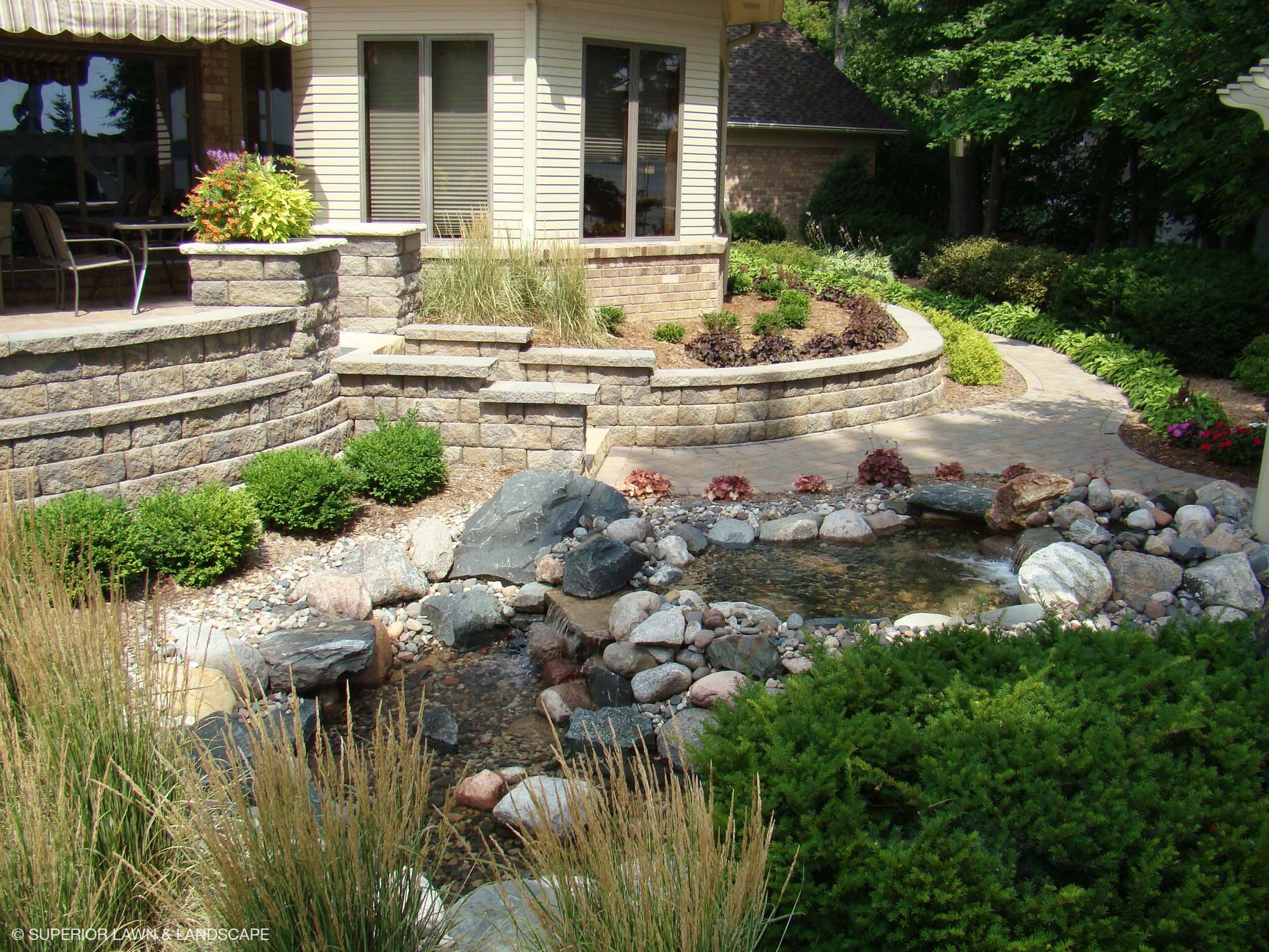 superior-lawn-landscape-water-features-006-front-yard-stone-ponds.jpg