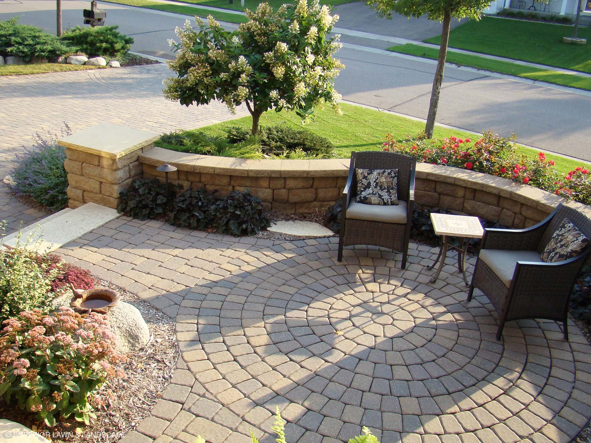 superior-lawn-landscape-front-entryways-036-stone-sitting-patio.jpg