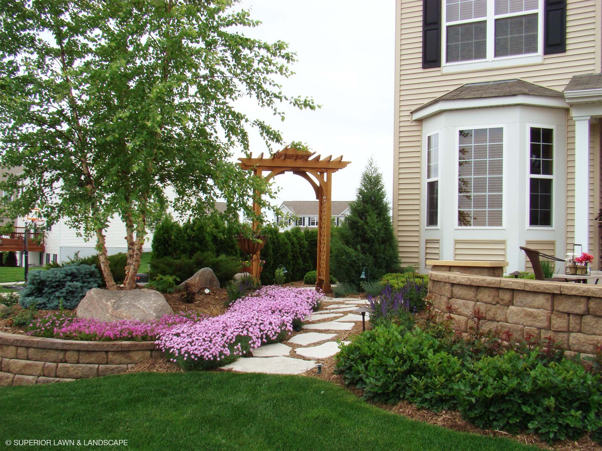 superior-lawn-landscape-front-entryways-026-pink-stone-walkway.jpg