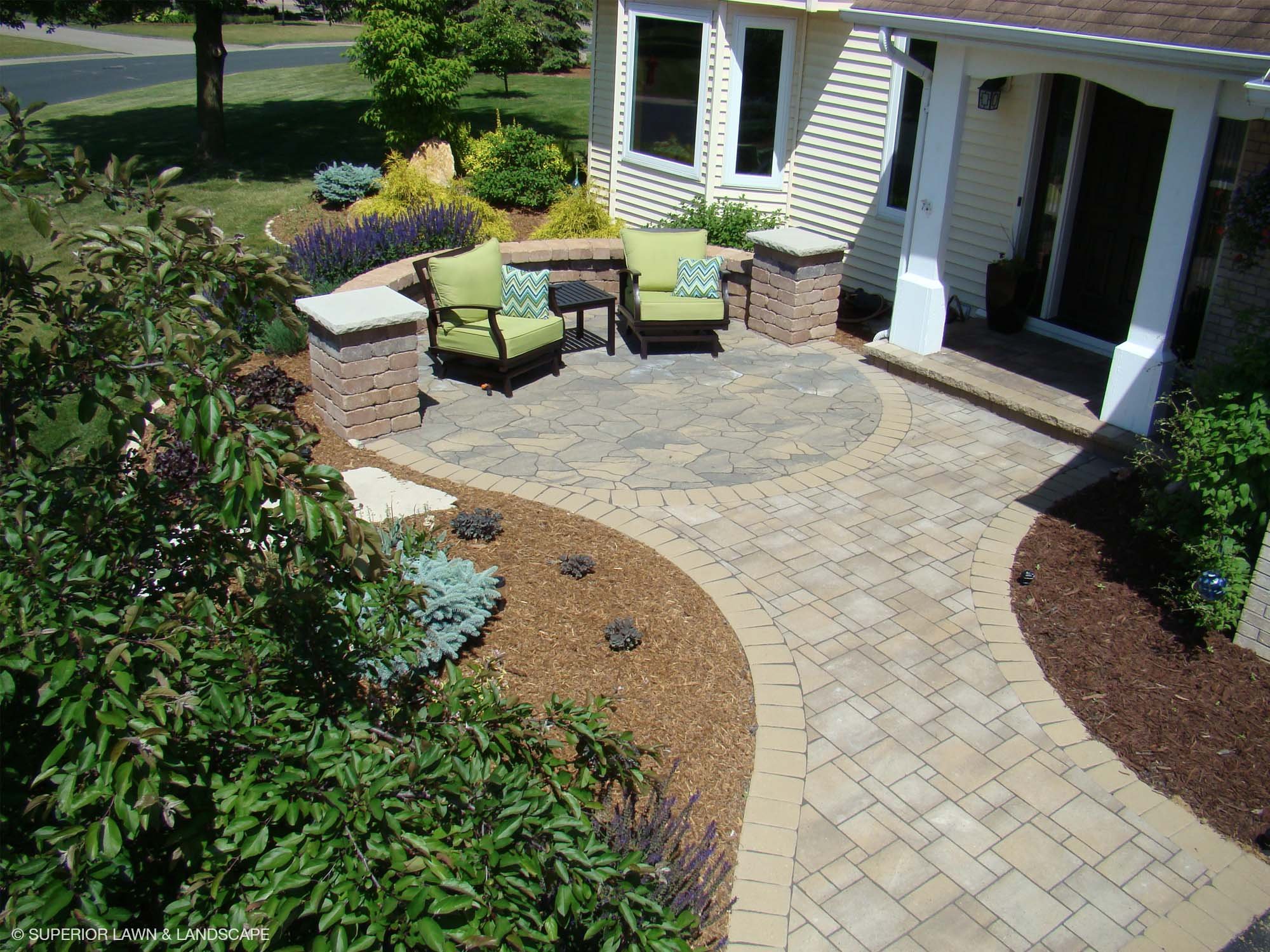 superior-lawn-landscape-front-entryways-003-stone-sitting-patio.jpg