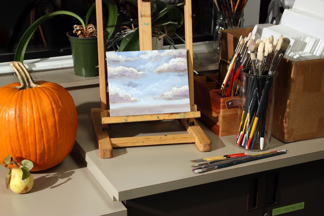 Marie's Easel with new Paintbrushes.jpeg
