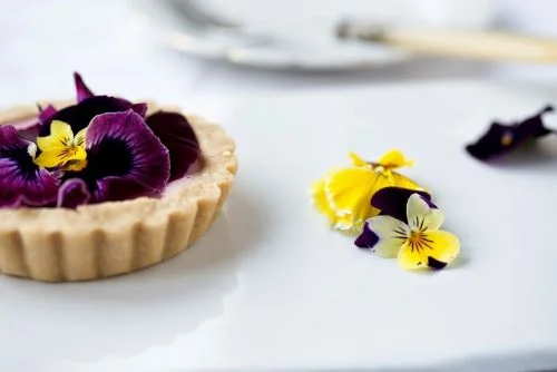 Raw viola and strawberry tart. Photography: Dawn Langley
