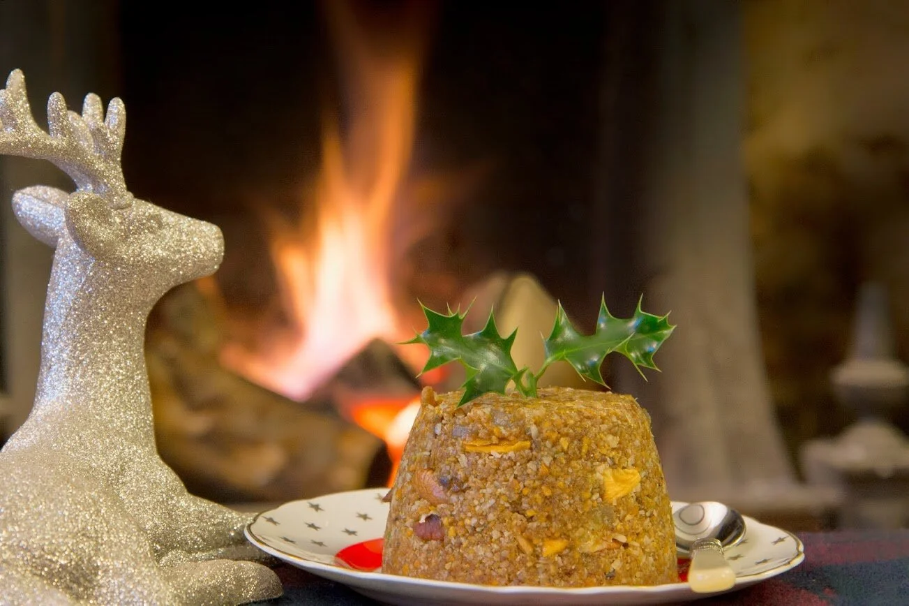 Tropical fruit Christmas pudding with brandy, lime and ginger syrup