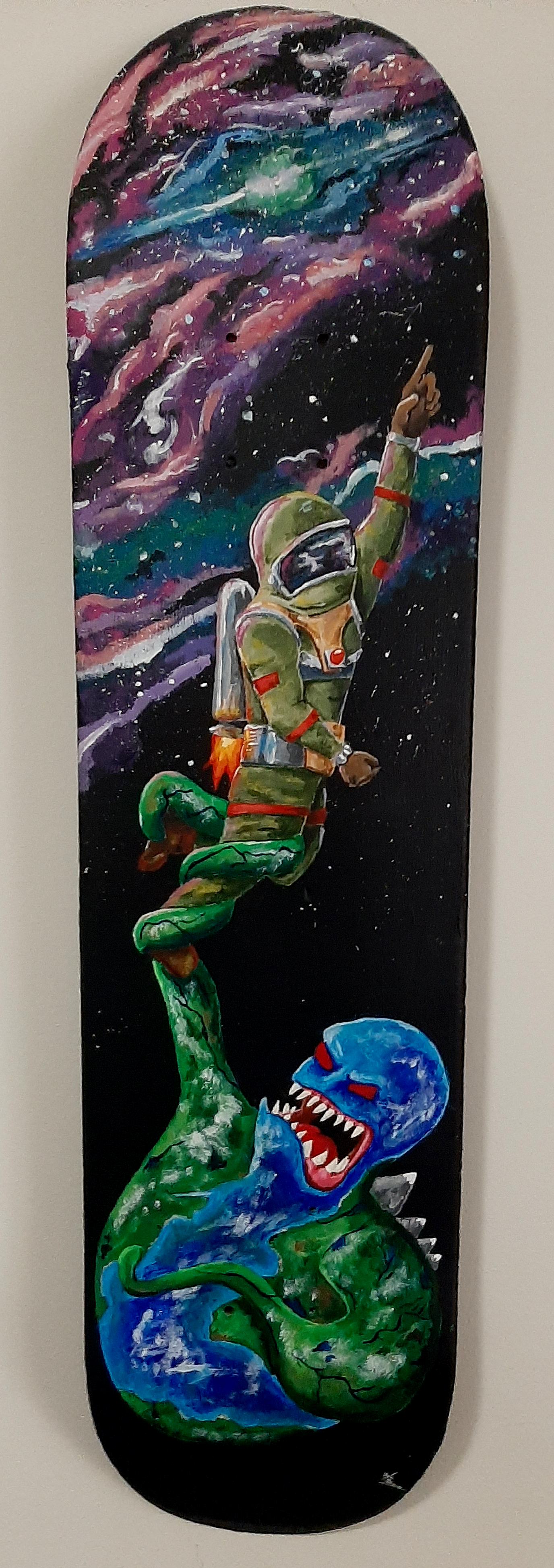 Space Boy- Acrylic on Skateboard- K. Andrews.png