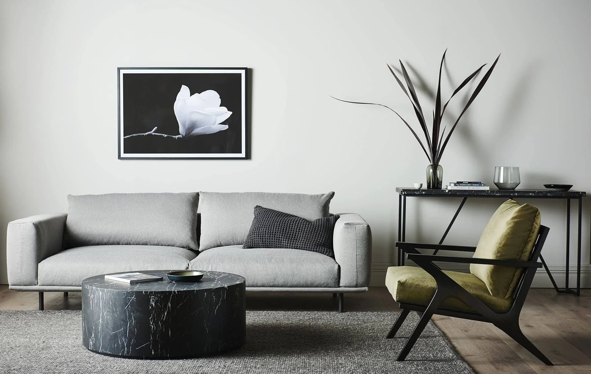 black-and-grey-minimal-living-room-ideas-featuring-Vittoria-Lewis-sofa-from-Globewest-1.jpg