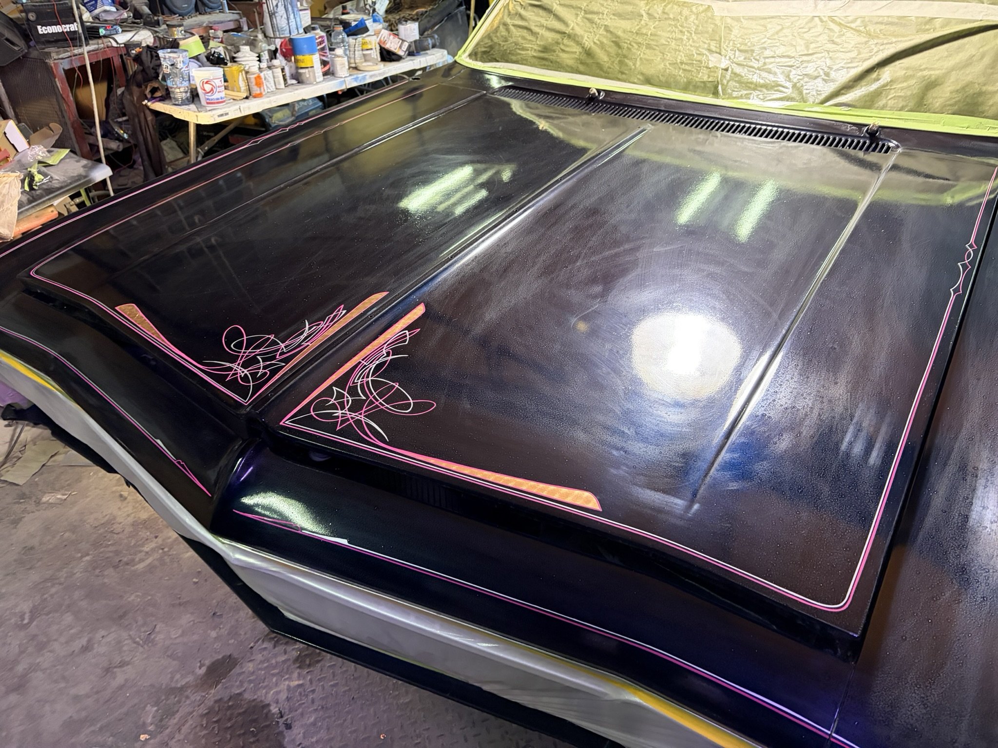 Car Hood pinstriped in magenta, silver with copper leaf by Matt Beckner