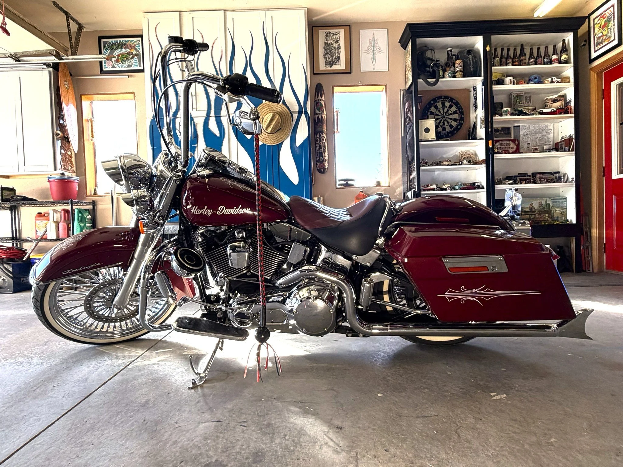 Maroon Harley Davidson with silver and white pinstriping and hand lettered "Harley-Davidson" tank by Matt Beckner.