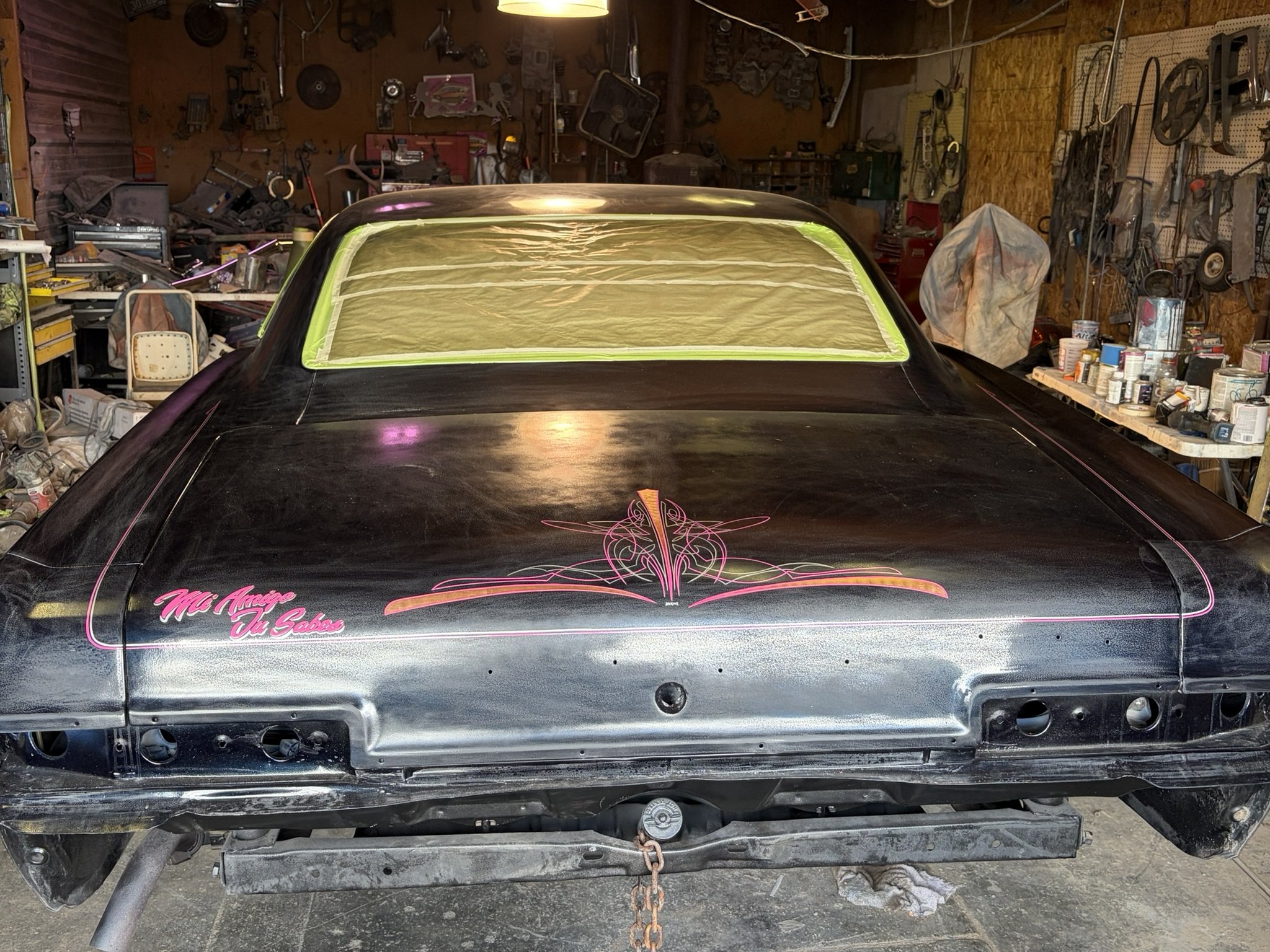 Trunk lid pinstriped in magenta, silver an copper leaf by Matt Beckner