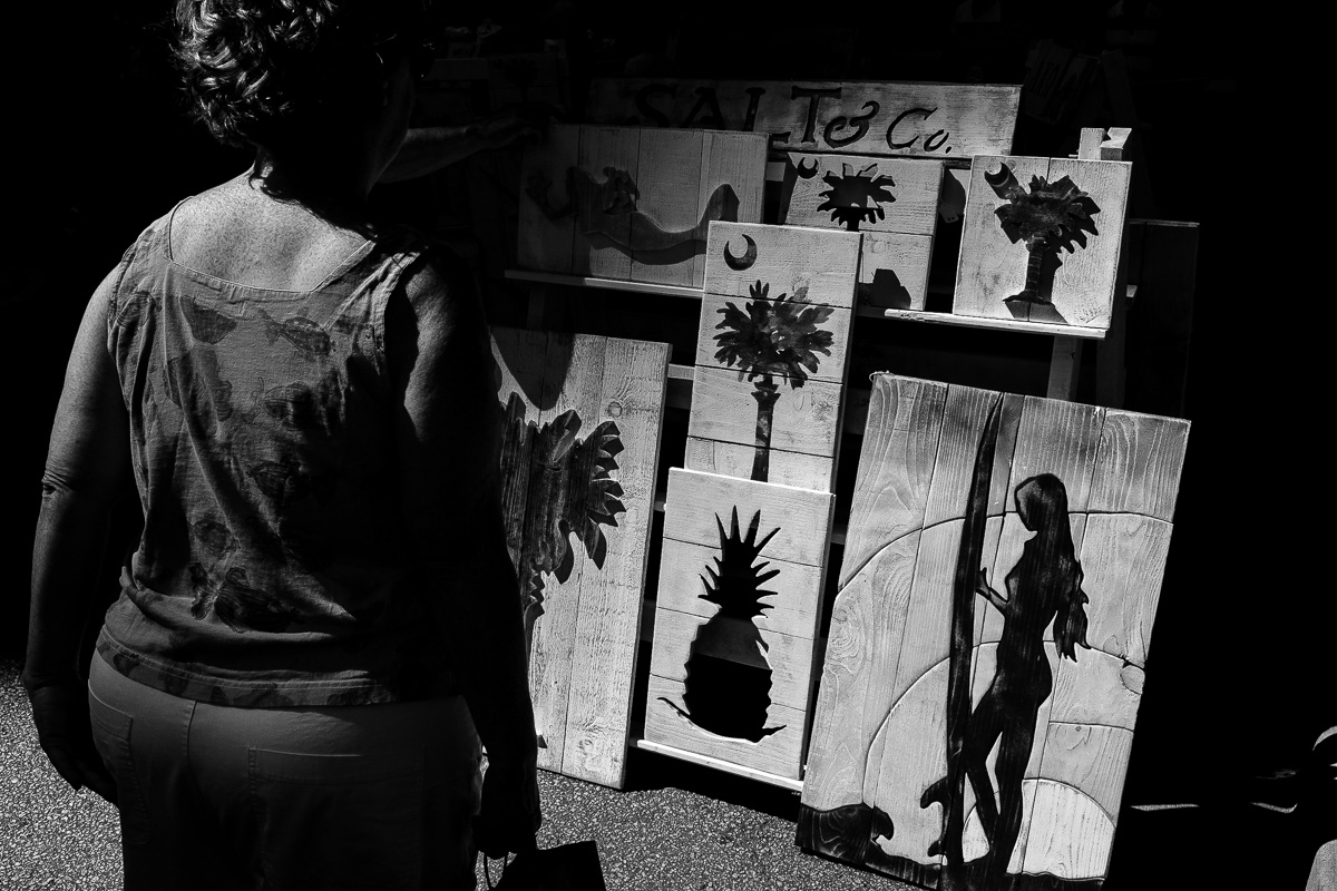 Woman looking at artwork