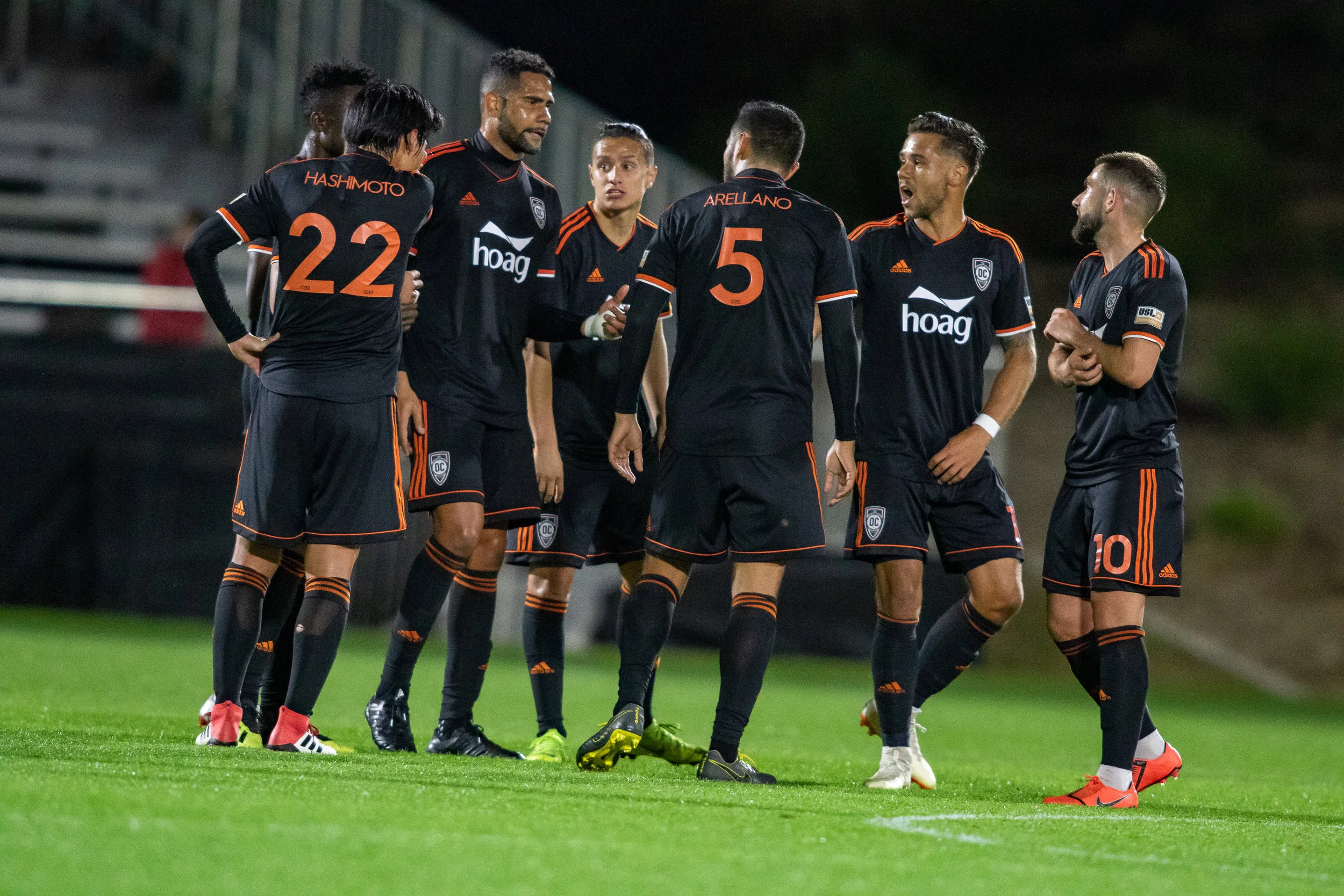 Orange County SC players regroup after giving up 2 goals to New Mexico United | Photo courtesy of Orange County SC