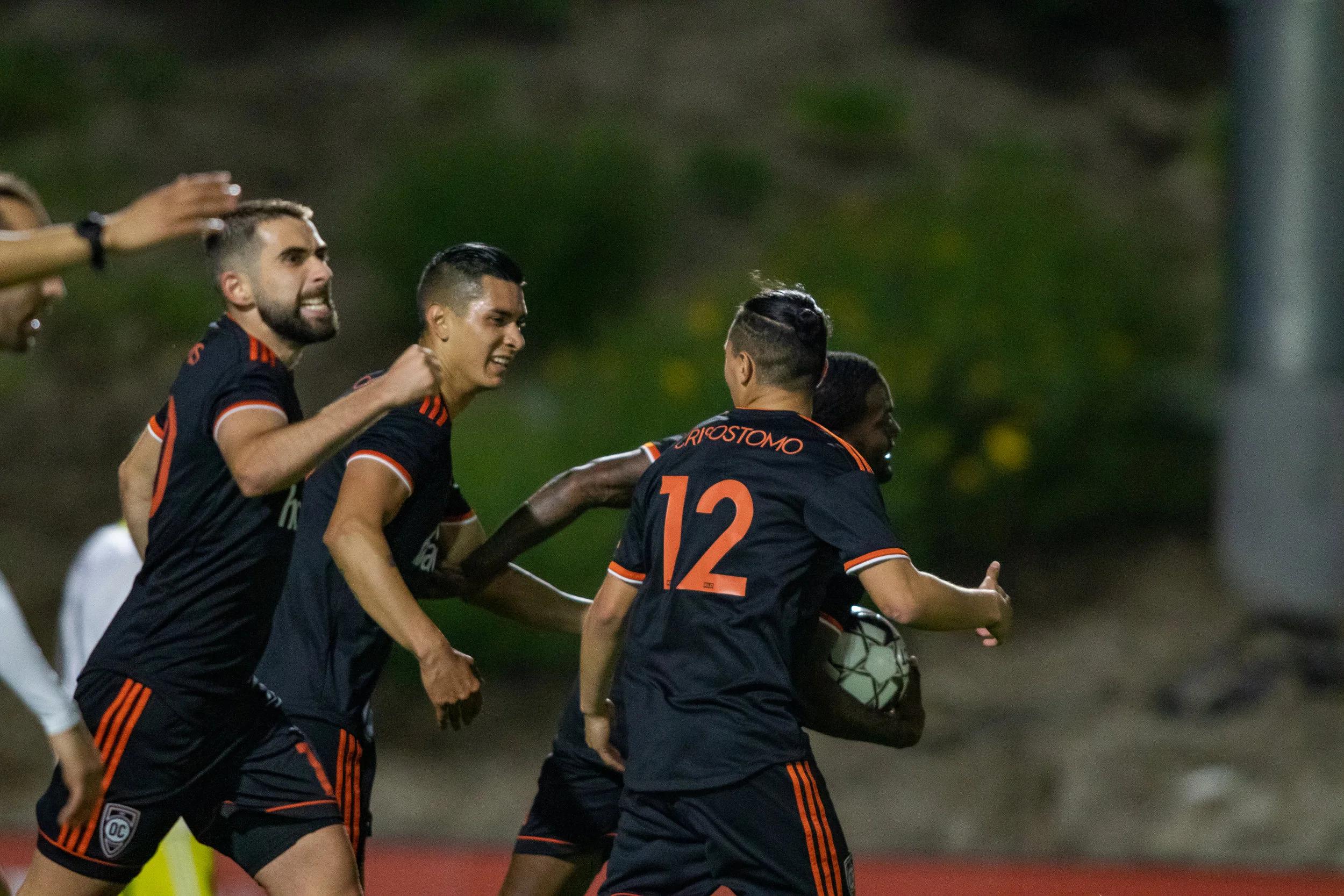 Orange County SC’s Darwin Jones celebrates with teammates after scoring a goal against New Mexico United | Photo courtesy of Orange County SC