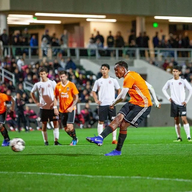 Orange County SC forward Michael Seaton converts on a penalty kick in Orange County SC’s 5-1 win over Tijuana Xolos U-23 team. | Photo courtesy of Orange County SC