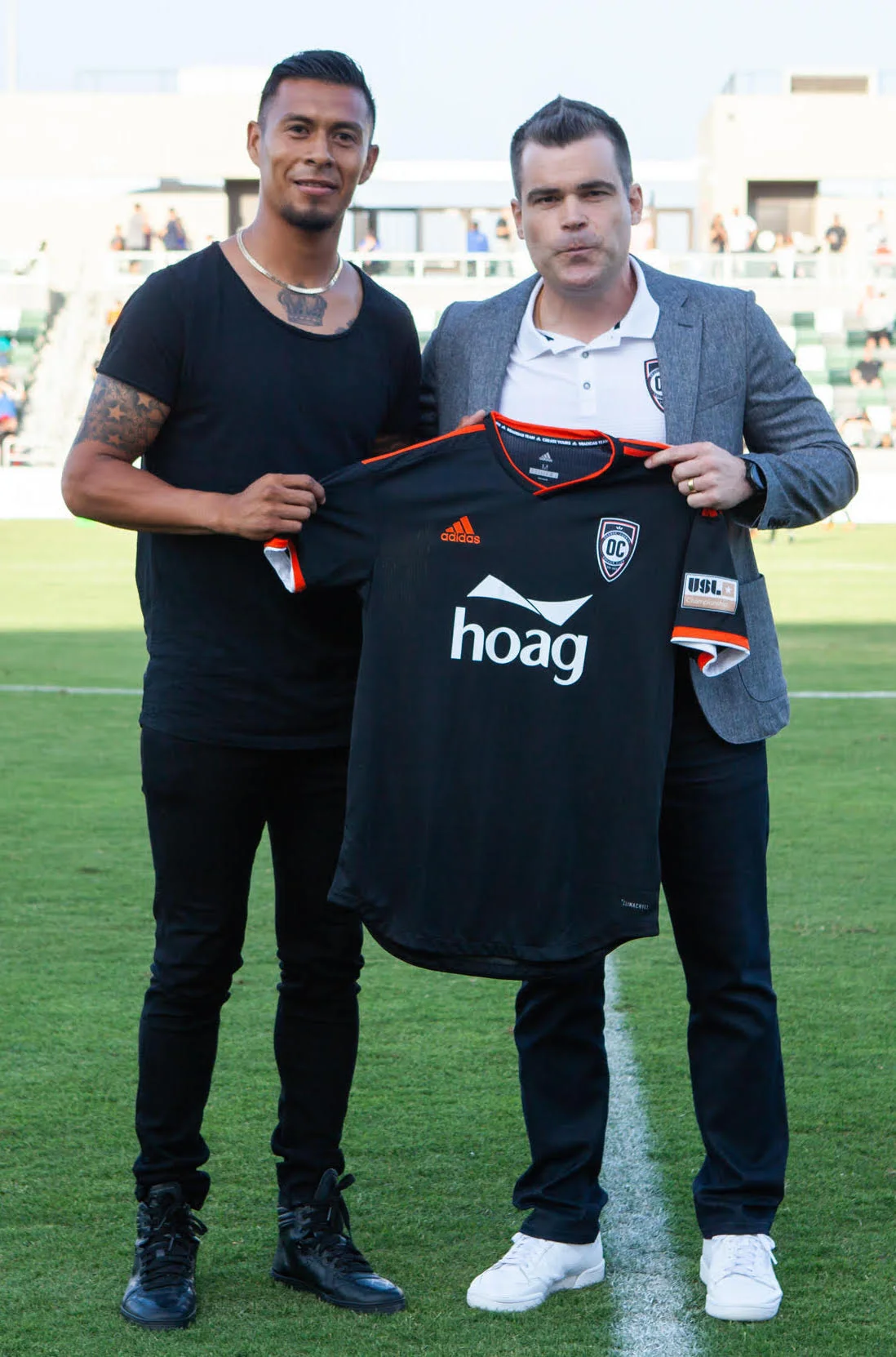 Michael Orozco with General Manager Oliver Wyss. Photo courtesy of Orange County SC/Liza Rosales