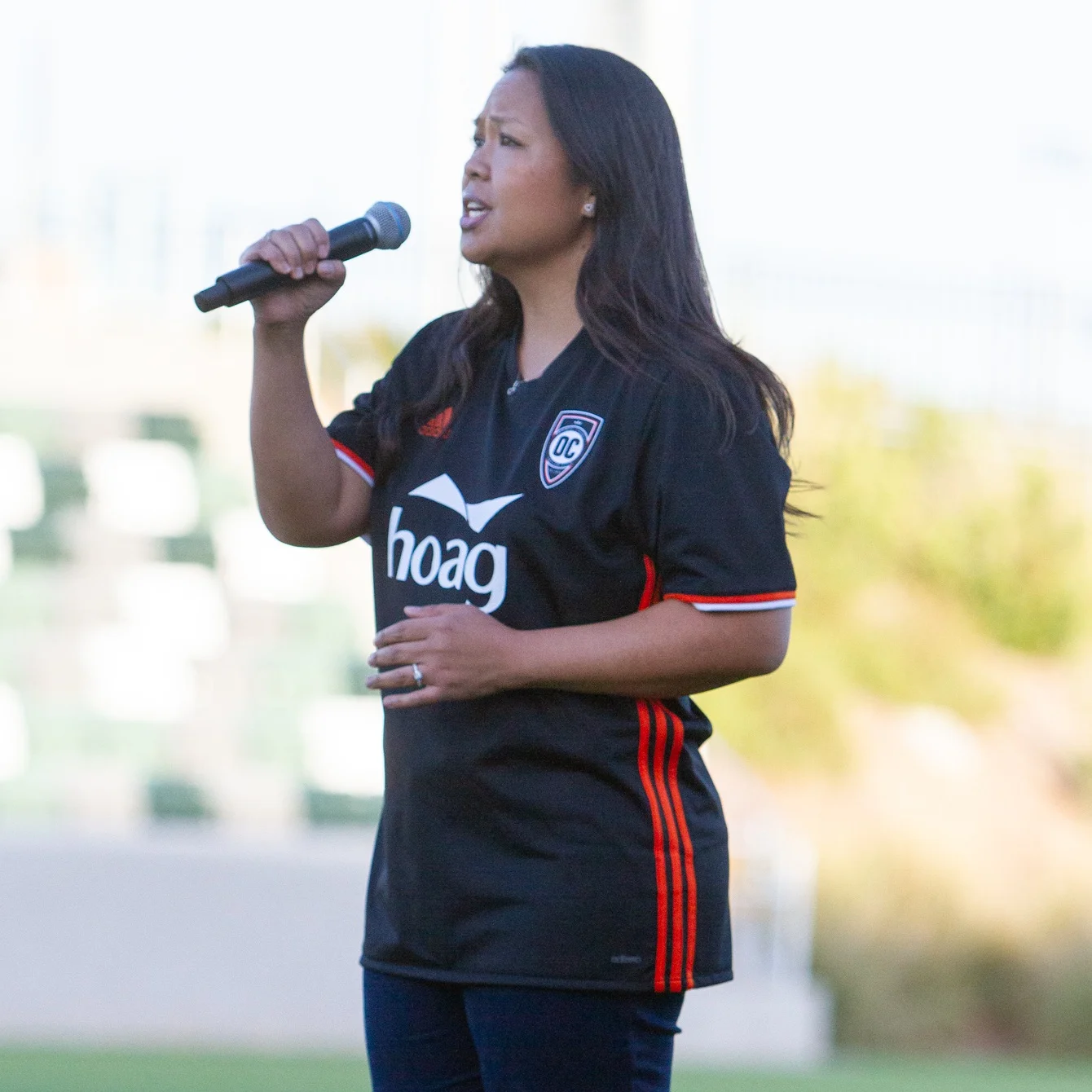 Katrina sings the national anthem at a recent match at Championship Soccer Stadium. | Photo courtesy of Orange County SC/Liza Rosales