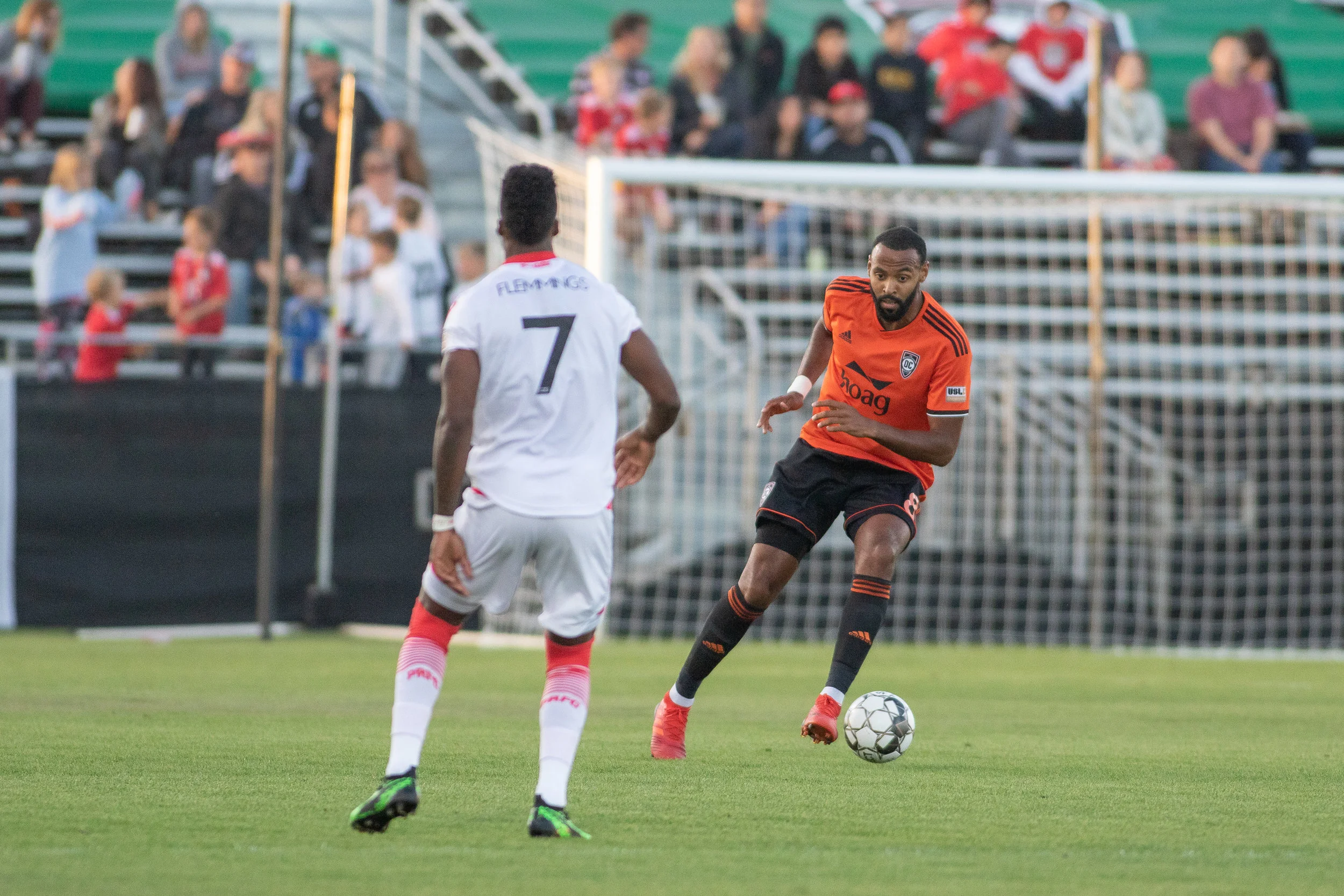 Trotter, right, on the ball in the OC half against Phoenix Rising FC on May 4, 2019. Photo courtesy of Liza Rosales/ Orange County SC.