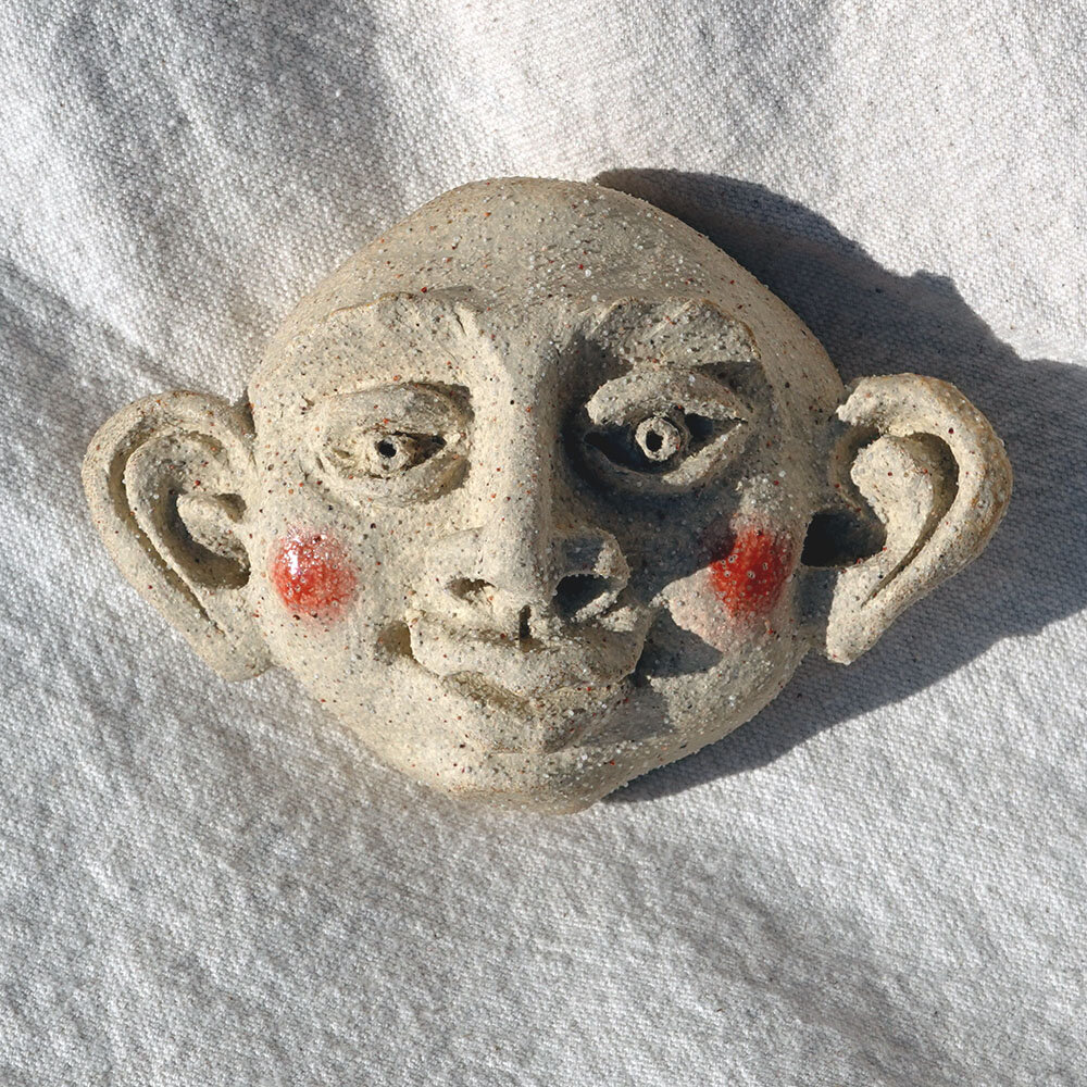 Friendly Wall-Hanging Face