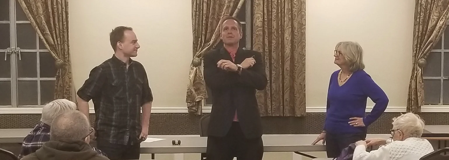 Aaron O’Neal does a lecture as Jo Ann Brinkman and Chris Perisich get suckered into helping (2019)