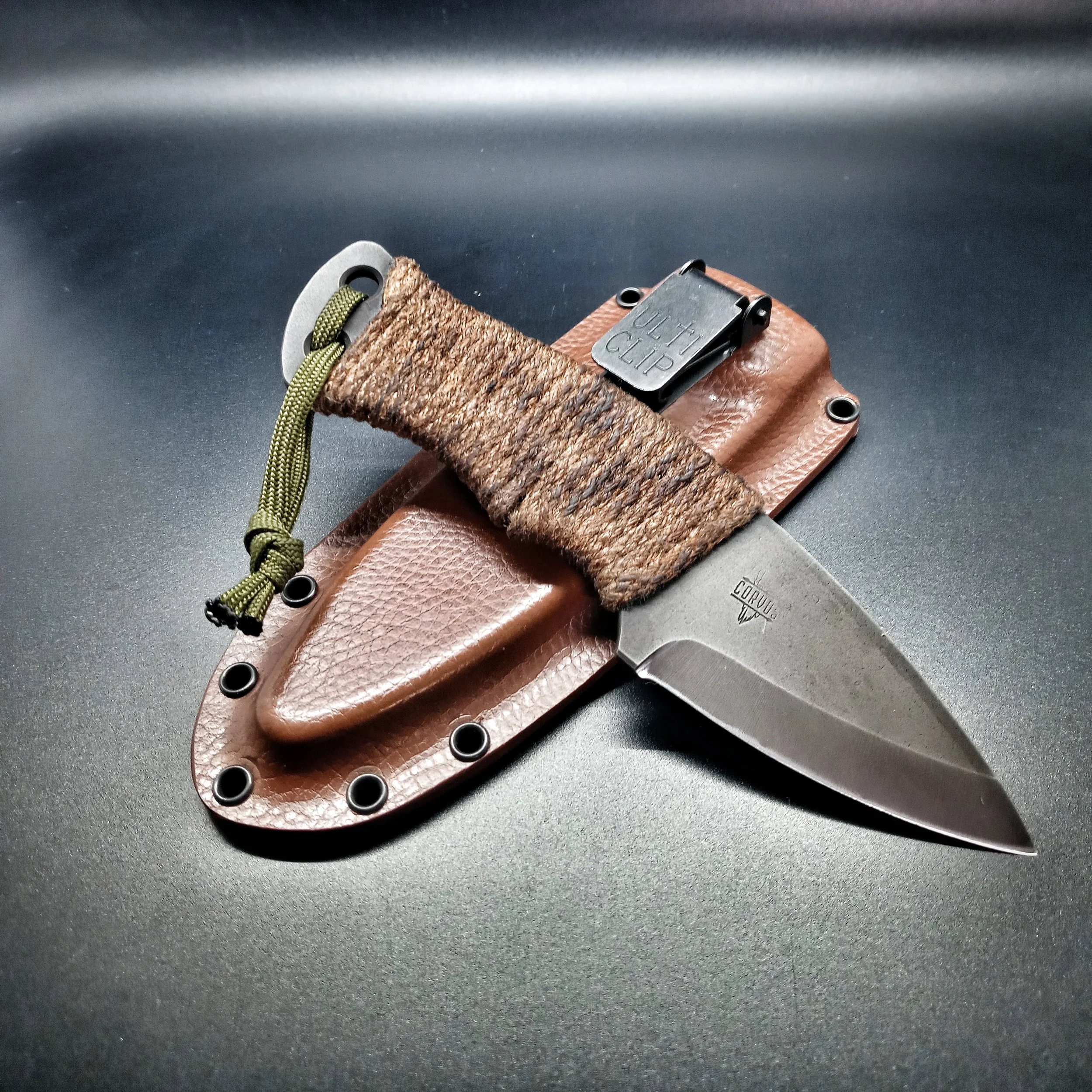 A knife resting on its sheath.