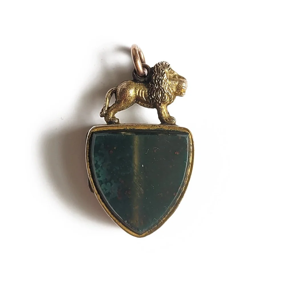 Victorian Gold cased Lion Shield Locket