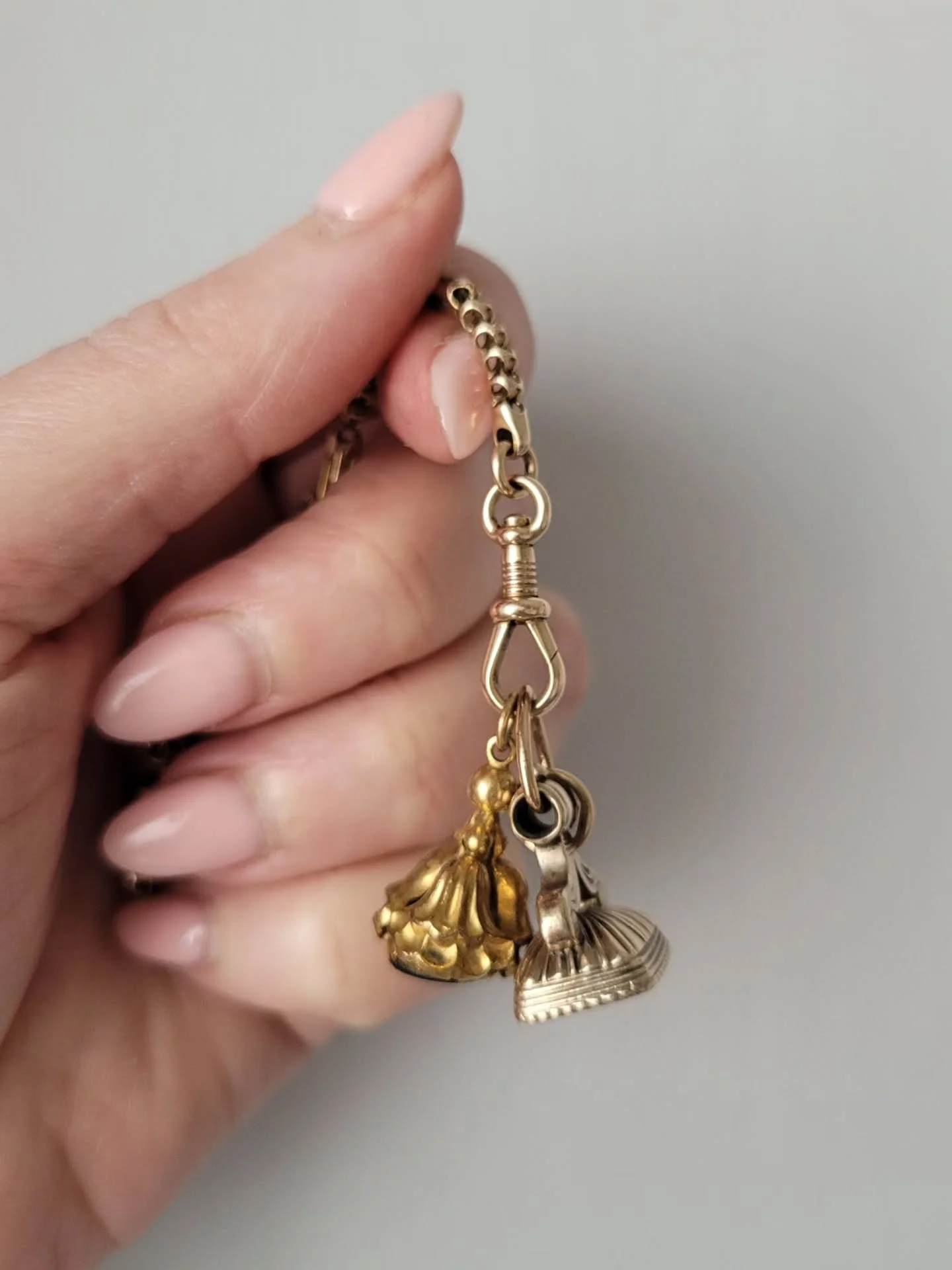 A pair of gorgeous little fobs, with subtle romantic messages. I guess these were the emojis of the Victorian era 💖💘💖

One is 'costume' and very affordable, the other is a  little more spendy, but solid gold. Both super sweet. Tap to shop.