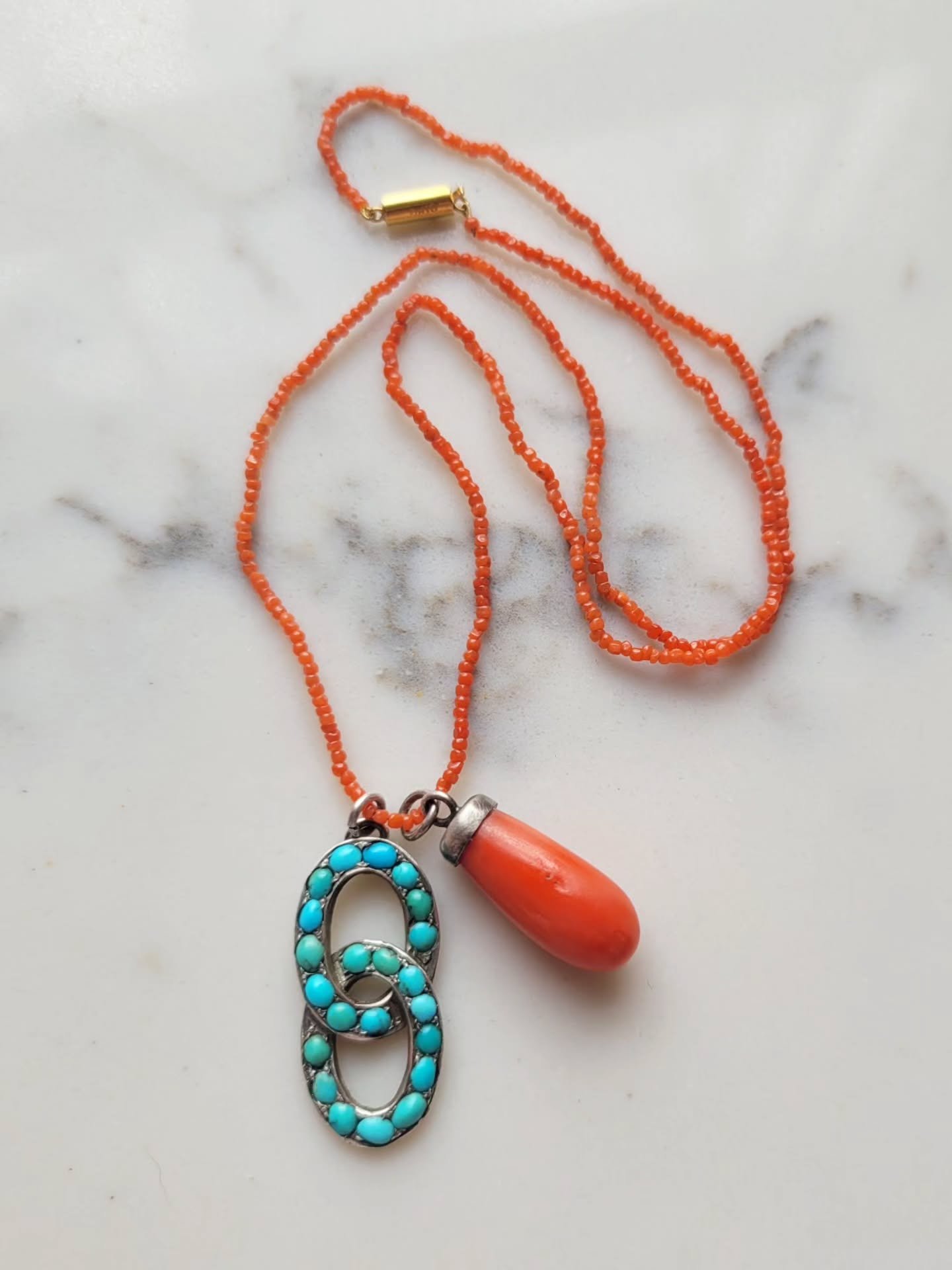 Oh this combo gives me joooyyyy!!!! Coral and turquoise, a real OG sort of pairing, these two cute little pendants work so well on this teeny coral bead chain. Tap to shop. 💙🪸