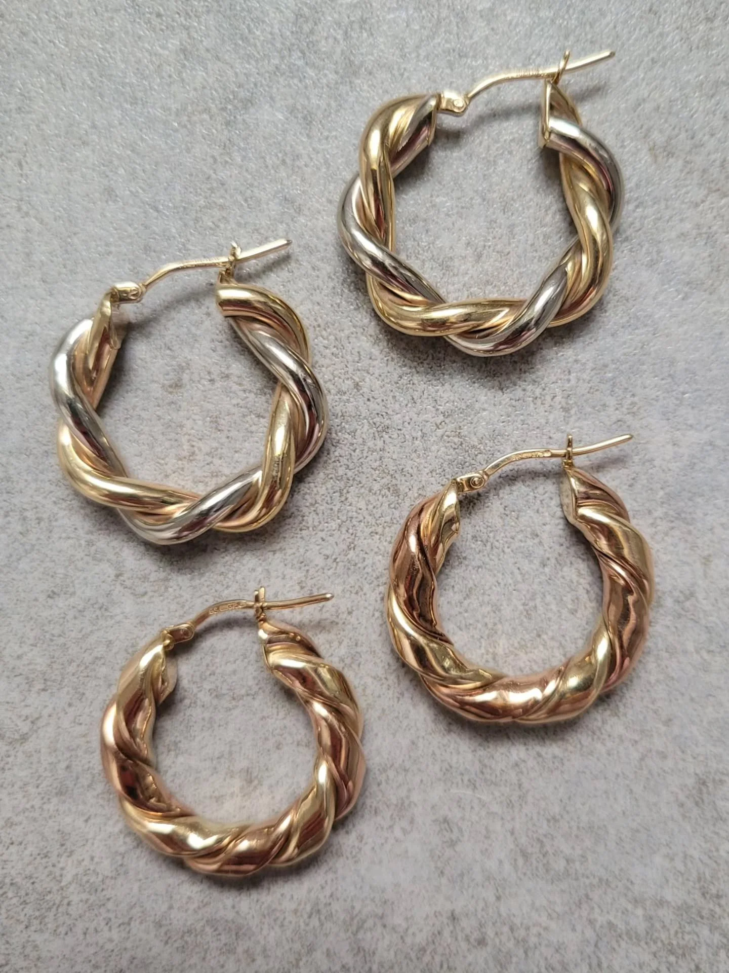 Where are my mixed gold girls? There's only one thing better than buttery yellow gold, and that's mixing it with its friends, rose and white. These bi-colour twist hoops are elite. Excellent size, beautifully made, and just a step or two up from your