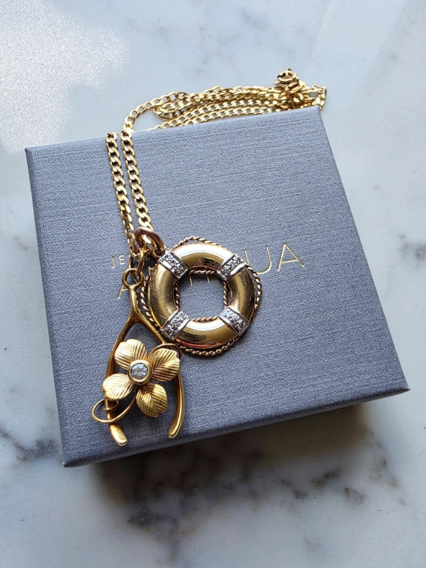 A lifebuoy for safety and protection, and a four leaf clover inside a wishbone for good luck. And diamonds because...diamonds! Two very cool and symbolic treasures, now up on the site.