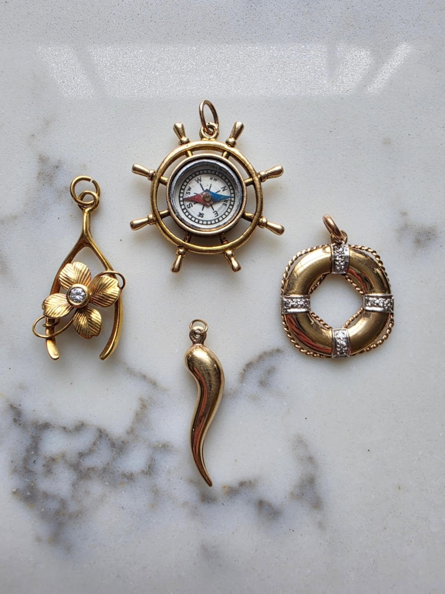 Pendants are what I sell most of (next to chains), and I think it's because of a combination of often being able to relate to the subject of a pendant (be it initials, a superstition, a connection) and the wearability of them. You might own one speci