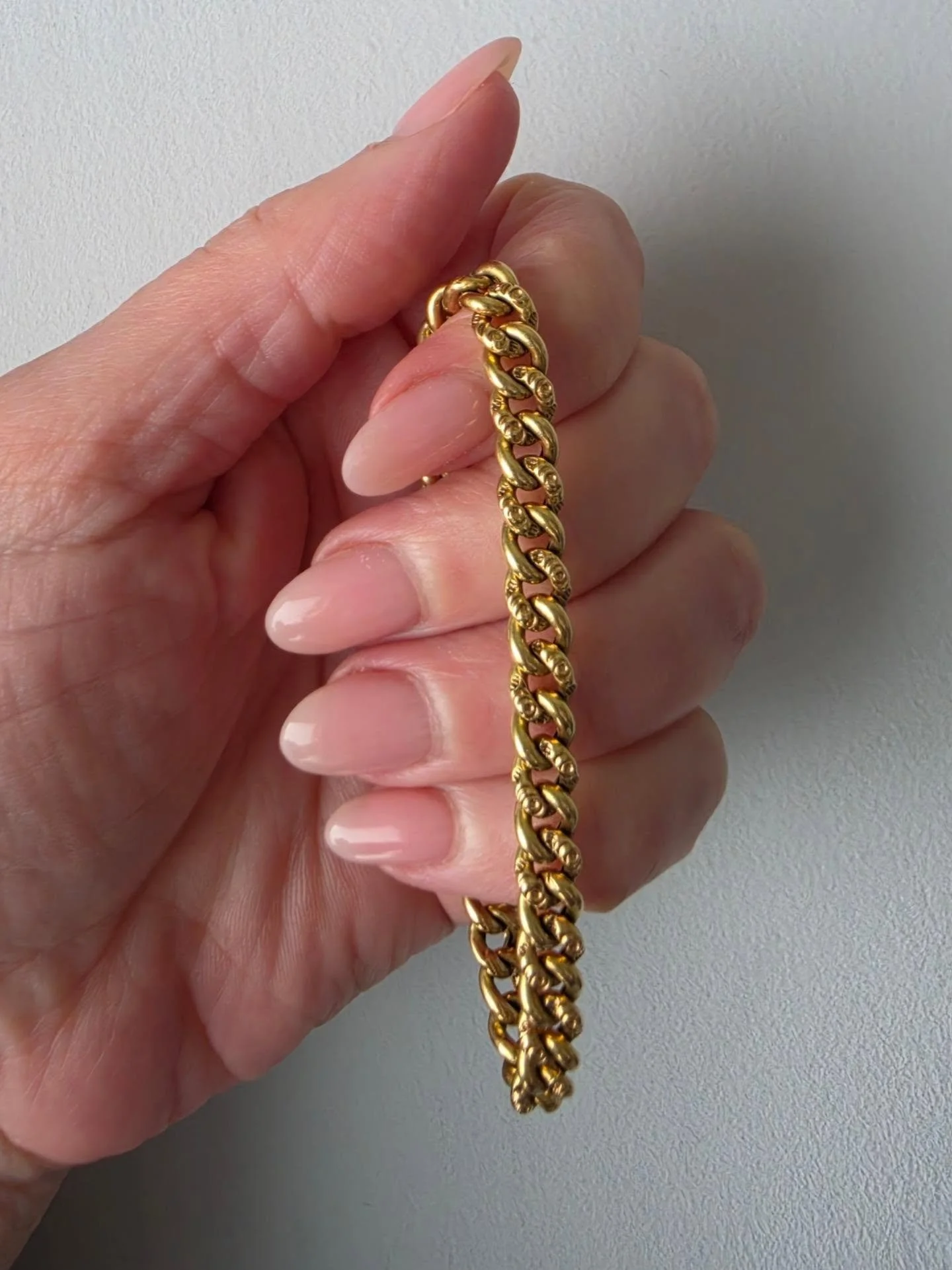The concept of 'day &amp; night' jewellery is just fabulous. This gorgey 18ct curb bracelet is refined and classic by day. But come night, you can flip it over and go wild with decorative floral links. Just beautiful, and available now (linked in sto