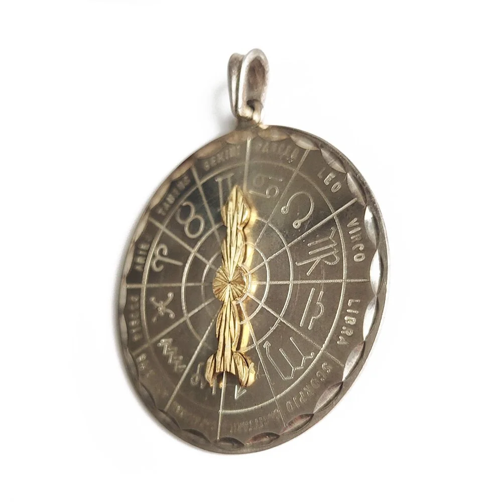 1970s Silver Zodiac Dial Pendant