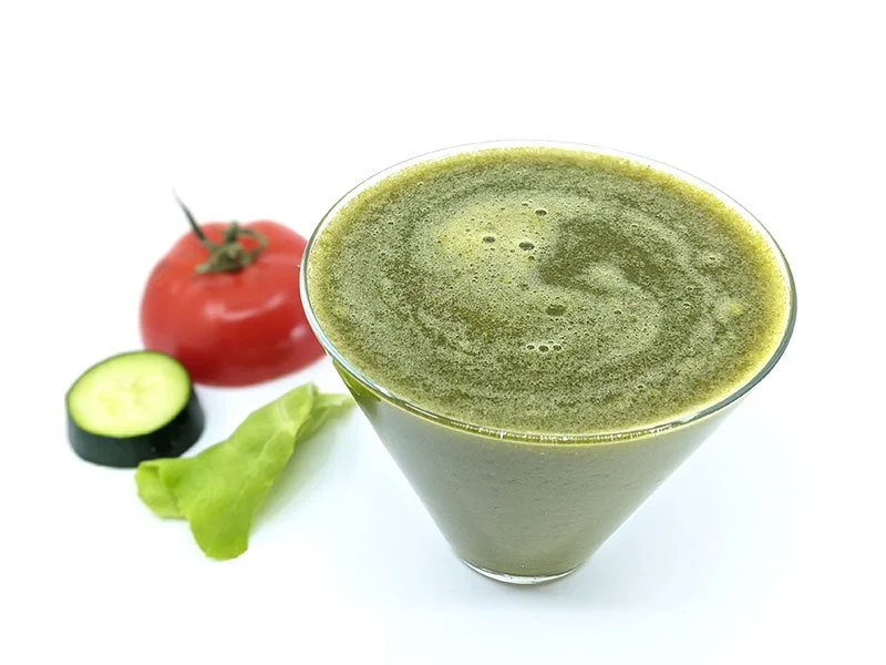 TLC juice in glass with ingredients alongside