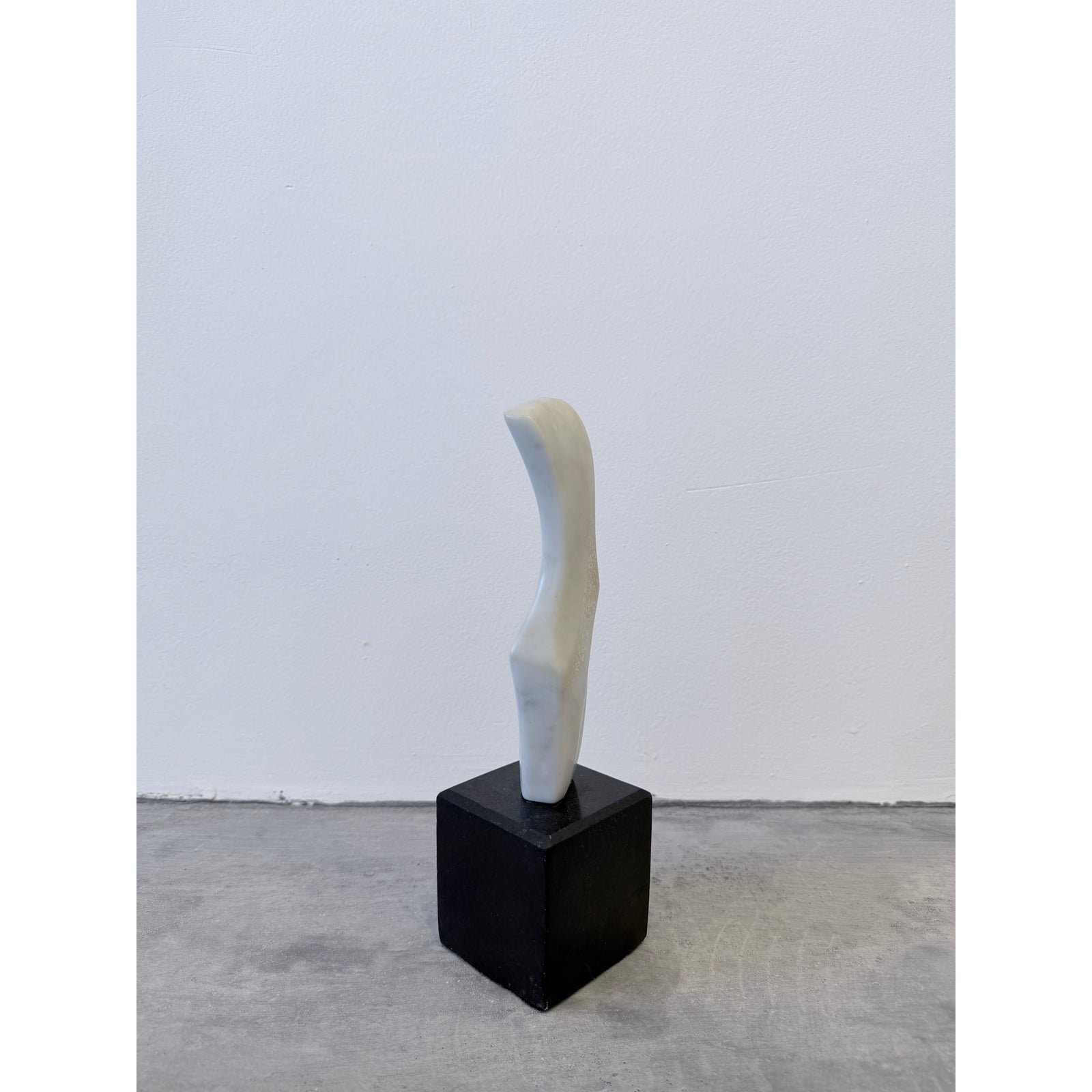 fatima-fontes-abstract-carrara-marble-sculpture-on-granite-base-brazil-1990
