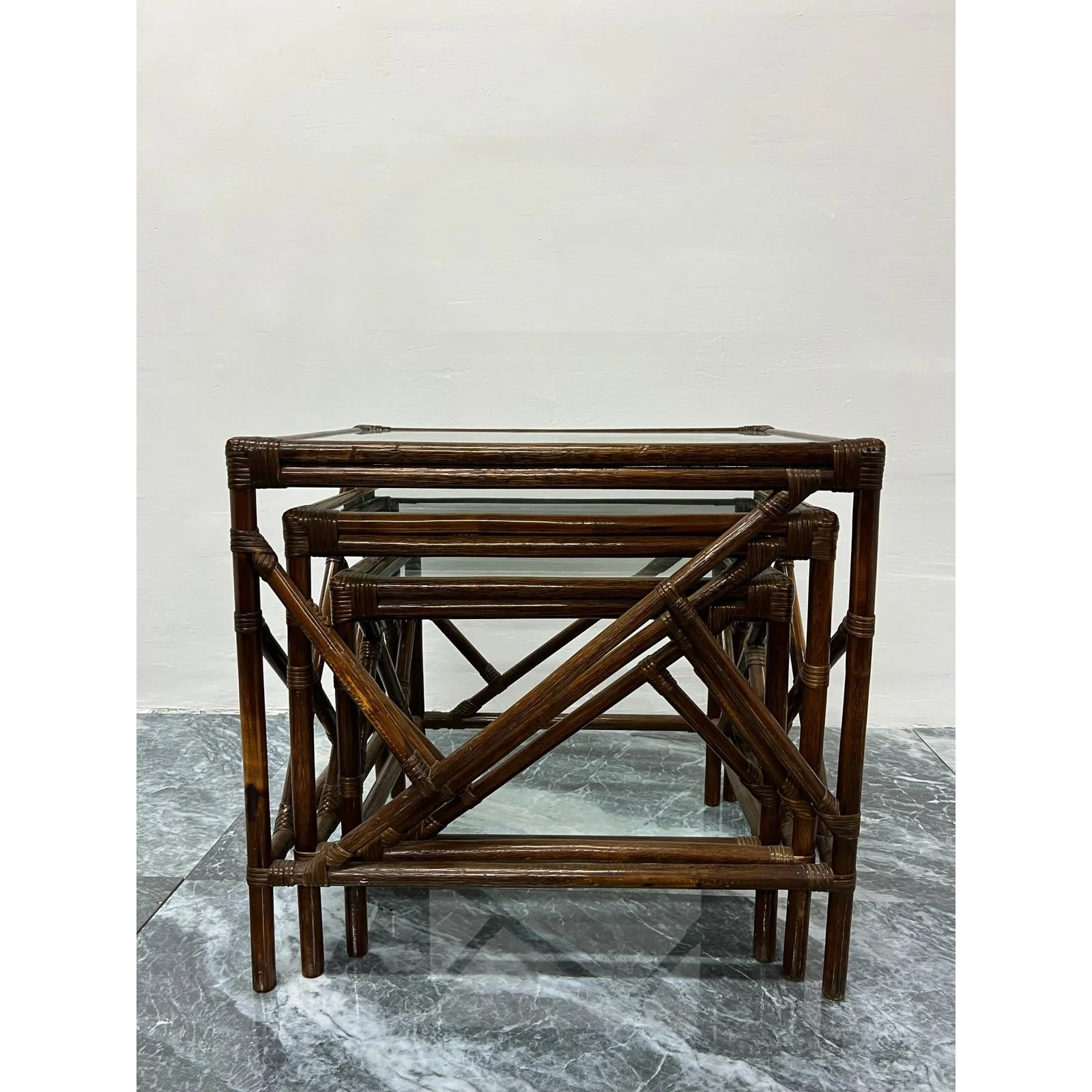 mid-century-rattan-and-glass-top-nesting-tables-set-of-three-3103