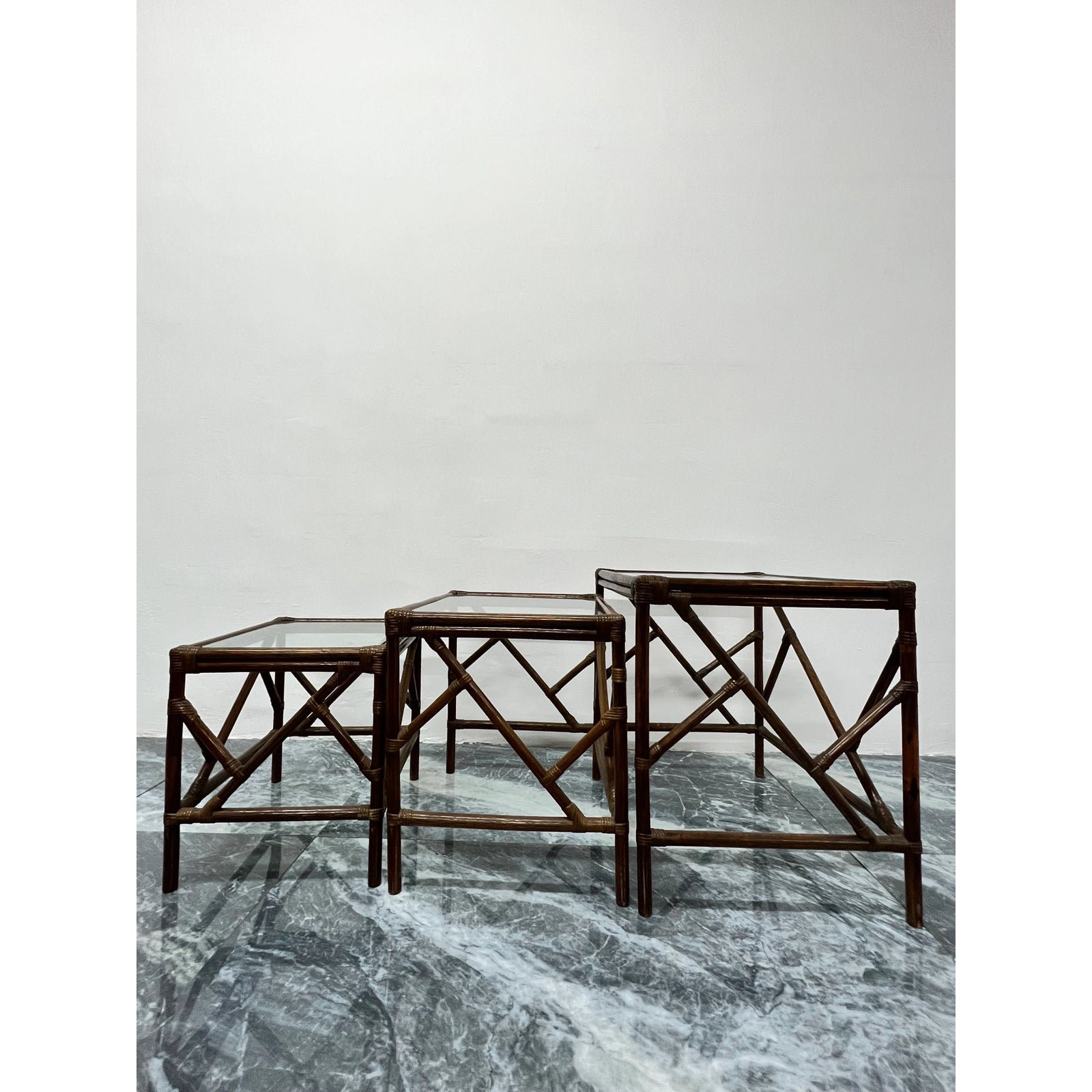 mid-century-rattan-and-glass-top-nesting-tables-set-of-three-2182