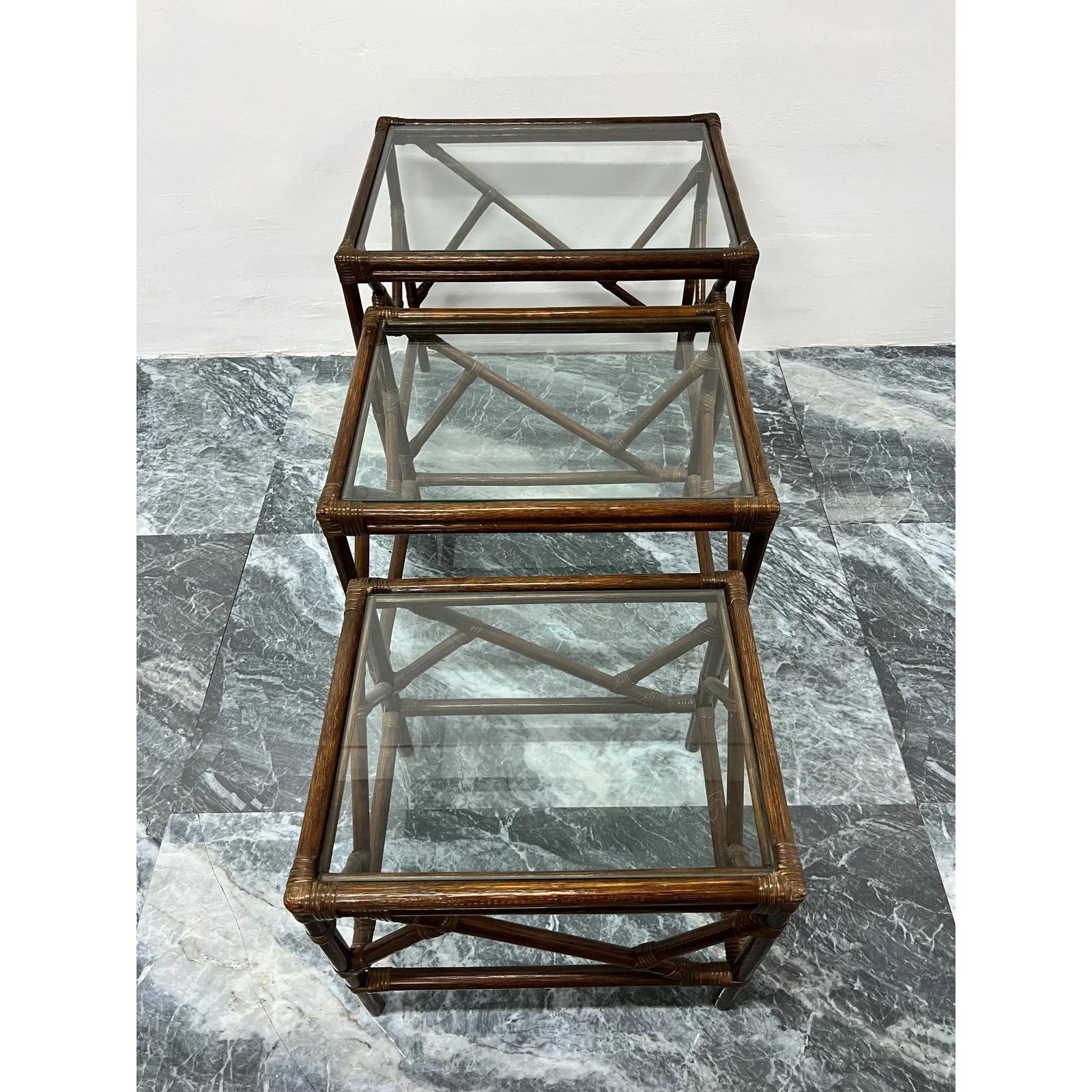 mid-century-rattan-and-glass-top-nesting-tables-set-of-three-6167
