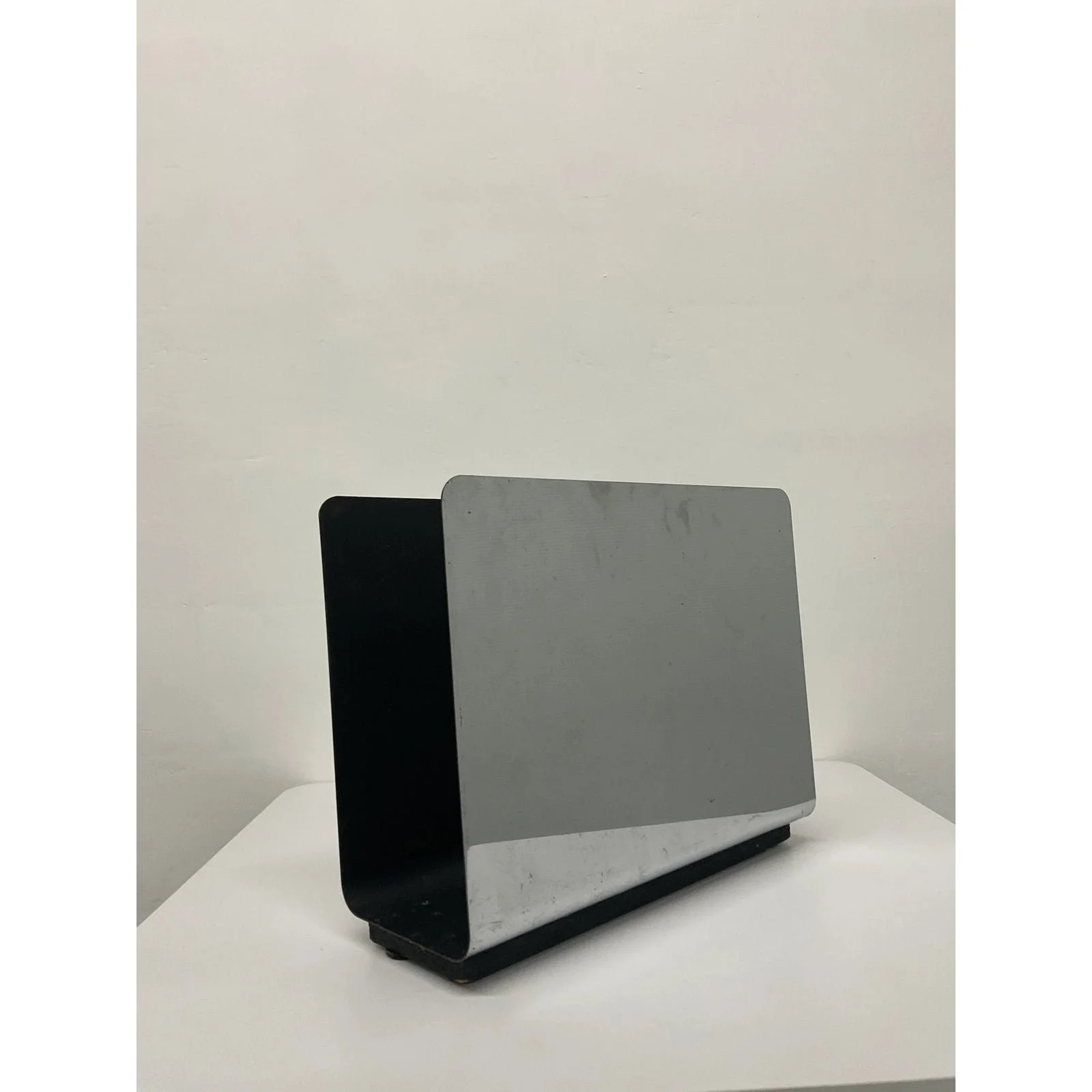 mid-century-modern-chrome-and-black-steel-magazine-rack-6816